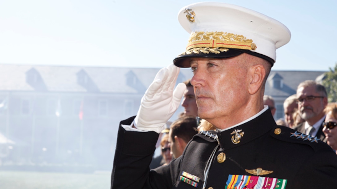 Commandant of the U.S. Marine Corps Gen. Joesph F. Dunford, Jr. salutes during the change of command ceremony at Marine Barracks Washington, D.C., Oct. 17, 2014. Dunford took command from Gen. James F. Amos as the 36th Commandant of the U.S. Marine Corps. (U.S. Marine Corps photo by Cpl. Lauren L. Whitney/Released)