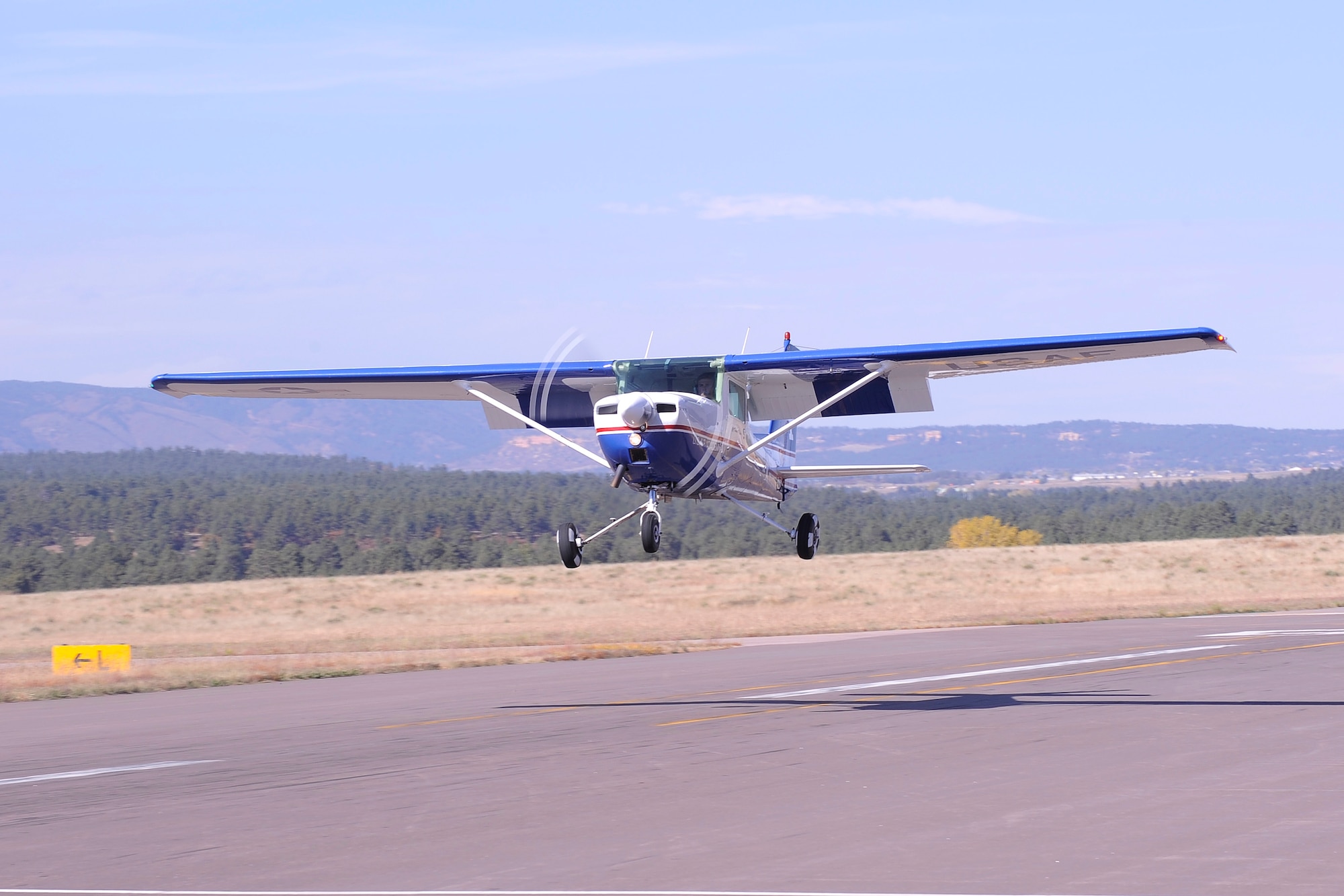 Cadet 2nd Class Brett Meyer prepares to land a Cessna T-51 Oct. 14, 2014, at the U.S. Air Force Academy, Colo. during the National Intercollegiate Flying Association Regional Safety and Flight Evaluation Conference. The Academy hosted this year's competition and scored first in overall school rankings, school flight events and school ground events. (U.S. Air Force photo/Bill Evans)