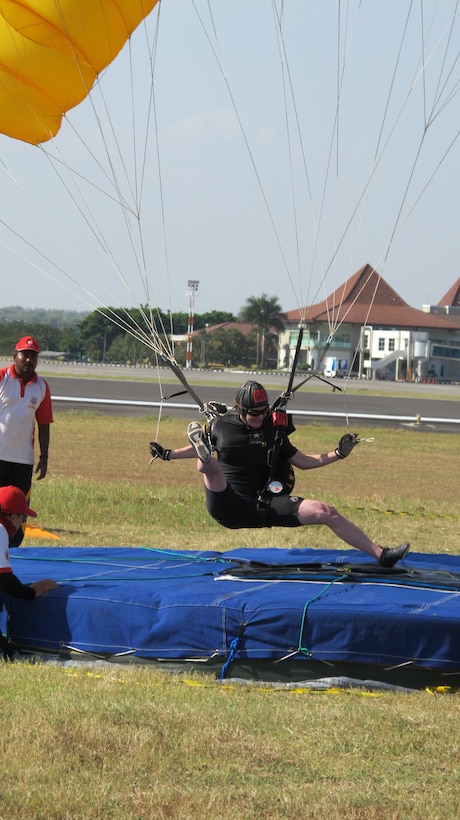 SFC Angela Nichols landing on the tuflet during a classic accuracy competition at the 38th Conseil International du Sport Militaire (CISM) in Solo, Indonesia 17-28 September