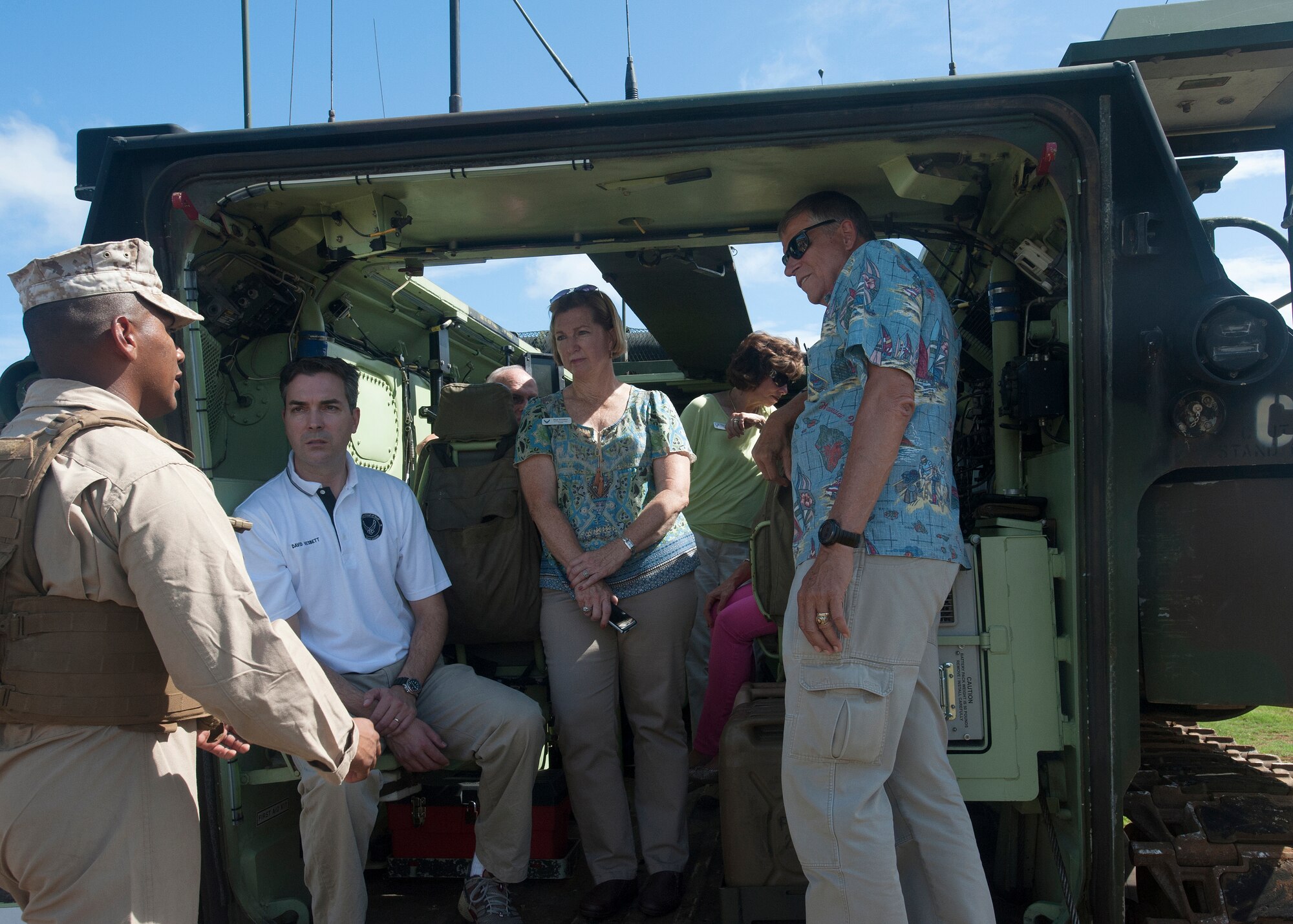 Members of the Air Force Civic Leader Program tour an amphibious assault vehicle, Oct. 15, 2014, at Marine Corps Base-Hawaii. At the invitation of Gen. Mark Welsh III, Air Force Chief of Staff, and hosted by Pacific Air Forces, the civic leaders spent three days visiting military installations and units to gain a hands-on understanding of the missions and capabilities of the Air Force, Army, Marine Corps, Navy and Coast Guard, and their respective contributions to the Pacific Rebalance. (U.S. Air Force photo by Tech. Sgt. Lucelia Ball/Released) 