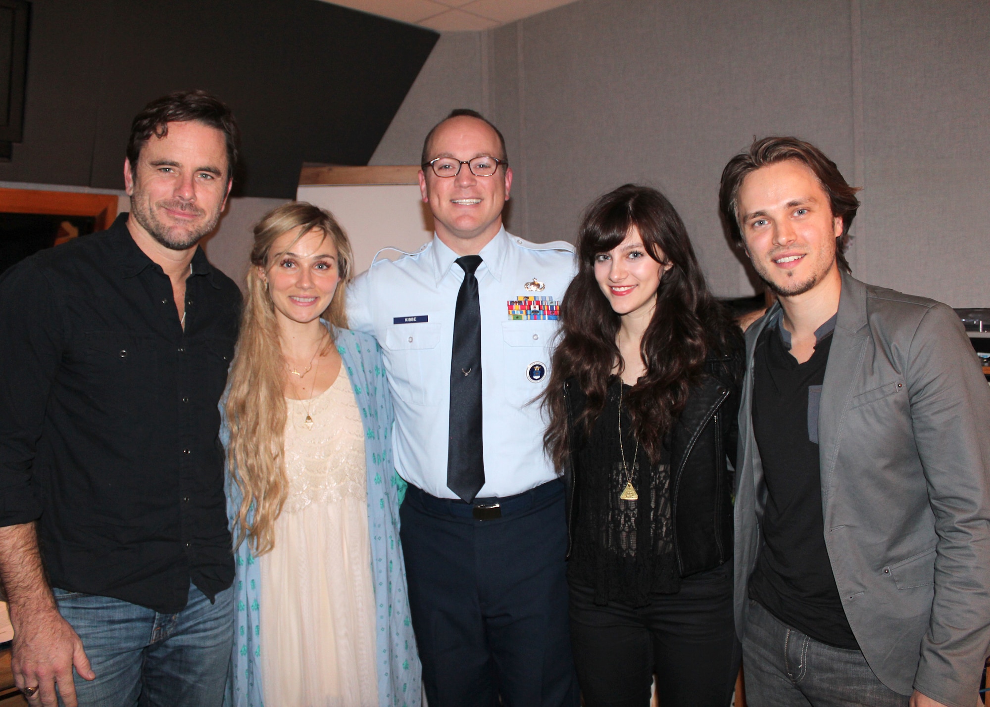 Master Sgt. Harry Kibbe is joined by TV’s Nashville cast members, from left, Charles “Chip” Esten, Clare Bowen, Aubrey Peeples and Jonathan Jackson for the 2014 “Red, White and Air Force Blue Christmas” radio special. It will air on be country stations in the United States and on the Armed Forces Network during the upcoming holiday season. The show is produced by the Air Force Recruiting Service. (U.S. Air Force photo/Dale Eckroth)