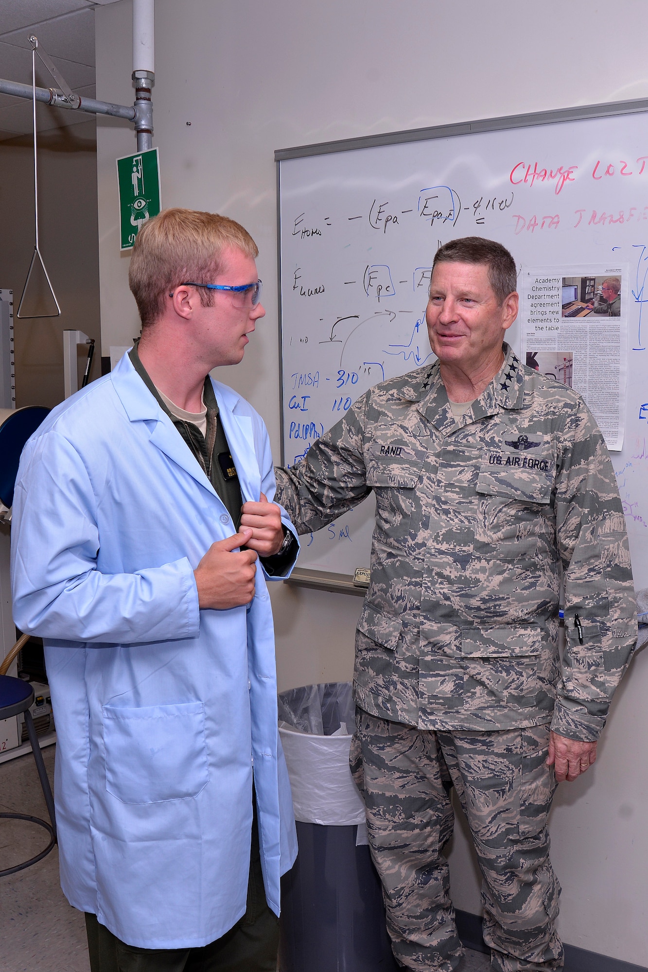 Gen. Robin Rand, Air Education and Training Command commander and Class of '79 
Academy grad, chats with a cadet during a tour of the Chemistry Department 
here Oct. 16, 2014. Rand led a civic leader tour of the Academy Oct. 15 - 16 to 
familiarize 18 AETC civic leaders with the installation's mission of 
developing leaders. (U.S. Air Force photo/Jason Gutierrez)

