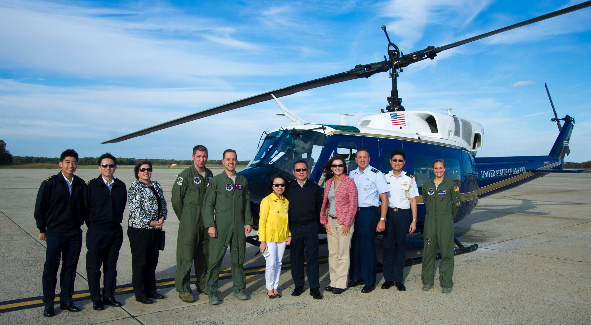 Members of the Republic of Singapore Air Force and the U.S. Air Force pose for a photo after an aerial tour of Washington, D.C. Maj. Gen. Hoo Cher Mou, center, Chief of the Republic of Singapore Air Force, is visiting U.S. Air Force key programs and receiving briefings from Air Force leaders as a mean to strengthen the coalition relationship. (U.S. Air Force photo/Airman 1st Class Ryan J. Sonnier)
