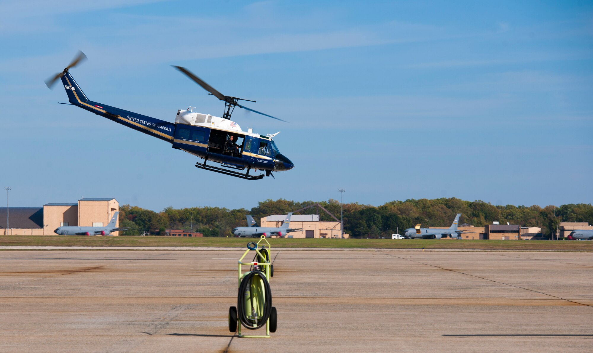 Maj. Gen. Hoo Cher Mou, Chief of the Republic of Singapore Air Force, departs in a UH-1N helicopter for tour of Washington, D.C. from the 1st Helicopter Squadron assigned to Joint Base Andrews, Md., Oct. 20, 2014. Mou is visiting U.S. Air Force key programs and receiving briefings from Air Force leaders as a mean to strengthen the coalition relationship. (U.S. Air Force photo/Airman 1st Class Ryan J. Sonnier)