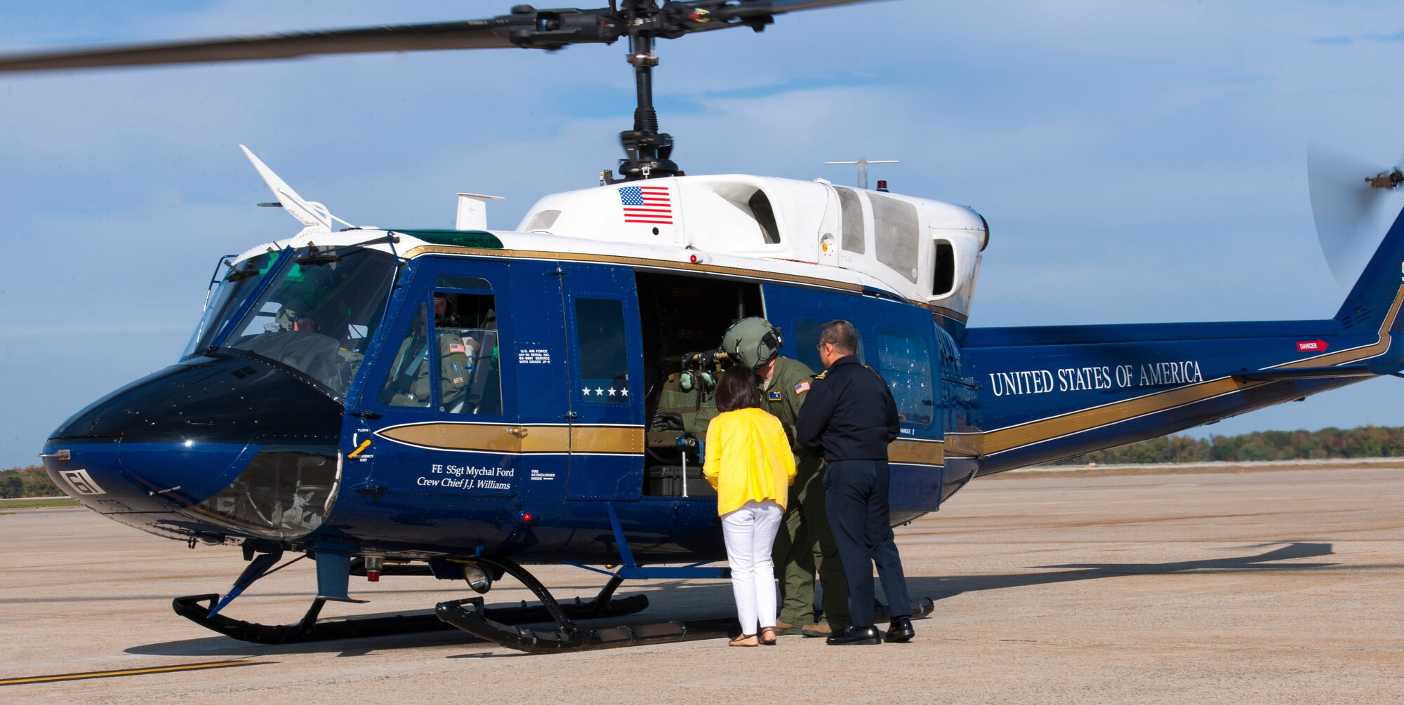 Maj. Gen. Hoo Cher Mou, Chief of the Republic of Singapore Air Force, and his wife Julie enter a 1st Helicopter Squadron UH-1N helicopter at Joint Base Andrews, Md., Oct. 20, 2014. Mou is visiting U.S. Air Force key programs and receiving briefings from Air Force leaders as a mean to strengthen the coalition relationship. (U.S. Air Force photo/Airman 1st Class Ryan J. Sonnier)