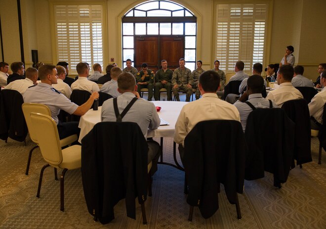 Cadets from Air Force Detachment 765 at The Citadel in Charleston, S.C.,  listen to Joint Base Charleston company grade officers as they speak about their respective careers and overall Air Force mission Oct. 22, 2014, at the Charleston Club on JB Charleston, S.C. The cadets were given the opportunity to listen to JB Charleston CGO’s during a mentorship conference where the cadets learned about the different jobs and careers available to them, and also the demands expectated of future second lieutenents. (U.S. Air Force photo/Airman 1st Class Clayton Cupit)