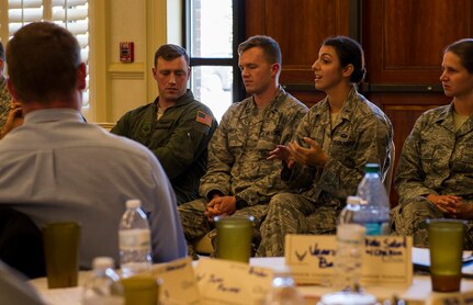 2nd Lt. Alexandra Trobe, 628th Air Base Wing public affairs community relations officer in charge, speaks with cadets from The Citadel, Oct. 22, 2014, at the Charleston Club on Joint Base Charleston, S.C. The cadets, from Air Force Detachment 765 at The Citadel in Charleston, S.C., were given the opportunity to listen to JB Charleston company grade officers during a mentorship conference where the cadets learned about the different jobs and careers available to them, and also the expectations demanded of future second lieutenents. (U.S. Air Force photo/Airman 1st Class Clayton Cupit)