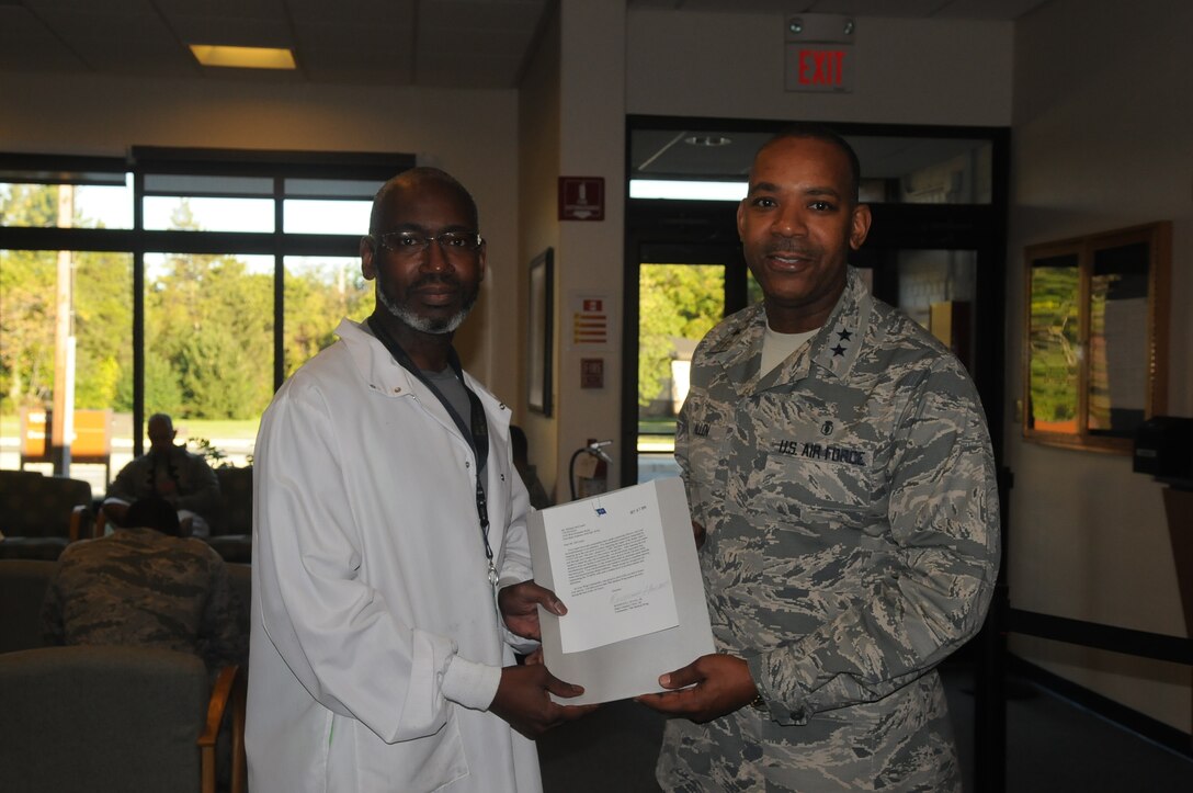 Mr. Michael McCombs, lab technician for the 779th Medical Group Dental Squadron received a Star Note from Maj. Gen. Roosevelt Allen, 79th Medical Wing Commander.  