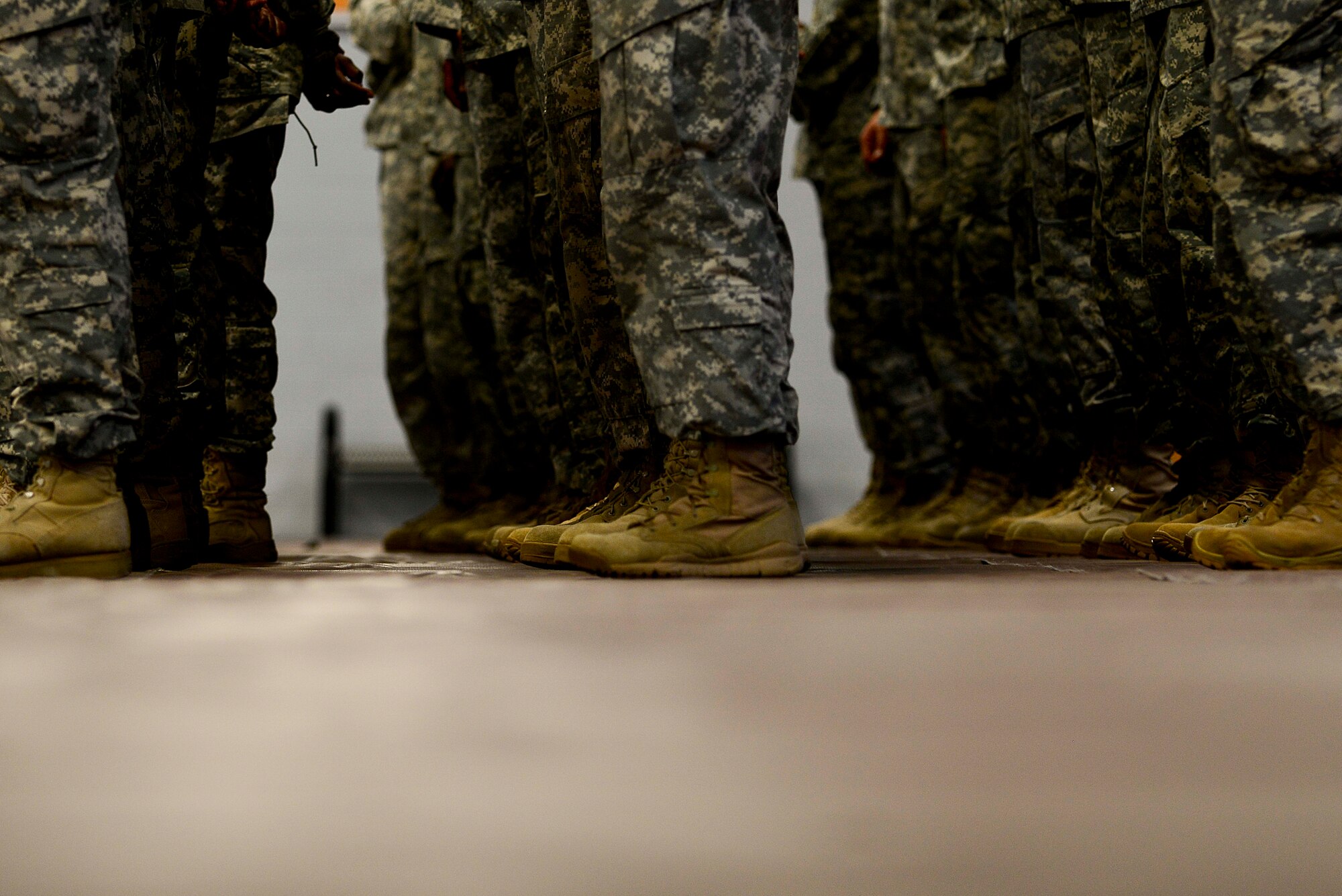 U.S. Army Soldiers assigned to the 53rd Transportation Battalion (Movement Control), 7th Transportation Brigade (Expeditionary), participate in a deployment ceremony at Fort Eustis Va., Oct. 22, 2014. The battalion specializes in the movement of Soldiers, equipment and other critical assets to deployed locations. (U.S. Air Force photo by Airman 1st Class Kimberly Nagle/Released) 