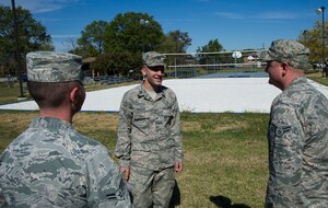 Chaplain (Capt.) Greg DuBow, center, an 11th Wing Protestant Chaplain, meets with dorm residents on Joint Base Andrews, Md., Oct. 9, 2014. DuBow, new to Andrews, discusses upcoming plans for the new ministry “Radical Resilience.” (U.S. Air Force photo/Airman 1st Class Ryan J. Sonnier)