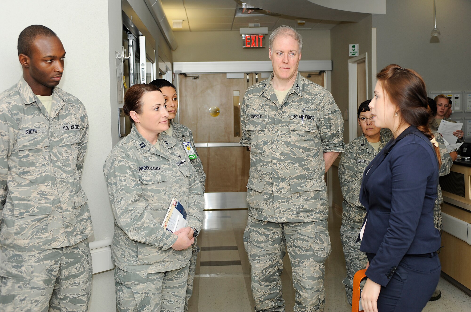 Geri Genant, Xenex Healthcare Services implementation manager speaks with U.S. Air Force Airmen assigned to the 633rd Medical Group intensive care unit at Langley Air Force Base, Va., Oct. 20, 2014. The hospital staff partnered with Xenex, the company that created a robot nicknamed Saul as part of a response plan designated to ensure the 633rd MDG is equipped to handle viruses like Ebola. (U.S. Air Force photo by Staff Sgt. Antoinette Gibson/Released)