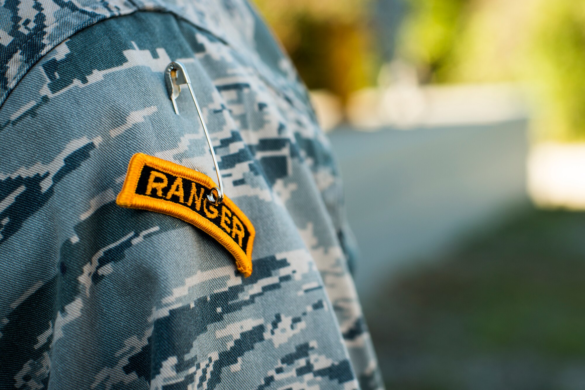 A Ranger tab hangs on the shoulder of U.S. Air Force 1st Lt. Casey Garner, 7th Air Support Operations Squadron air liaison officer (ALO), following his graduation from the U.S. Army Ranger School Oct. 17, 2014, at Fort Benning, Ga. Garner is the first ALO to graduate from the course. (U.S. Air Force photo by Airman 1st Class Ryan Callaghan/Released)