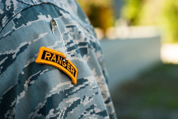 A Ranger tab hangs on the shoulder of U.S. Air Force 1st Lt. Casey Garner, 7th Air Support Operations Squadron air liaison officer (ALO), following his graduation from the U.S. Army Ranger School Oct. 17, 2014, at Fort Benning, Ga. Garner is the first ALO to graduate from the course. (U.S. Air Force photo by Airman 1st Class Ryan Callaghan/Released)