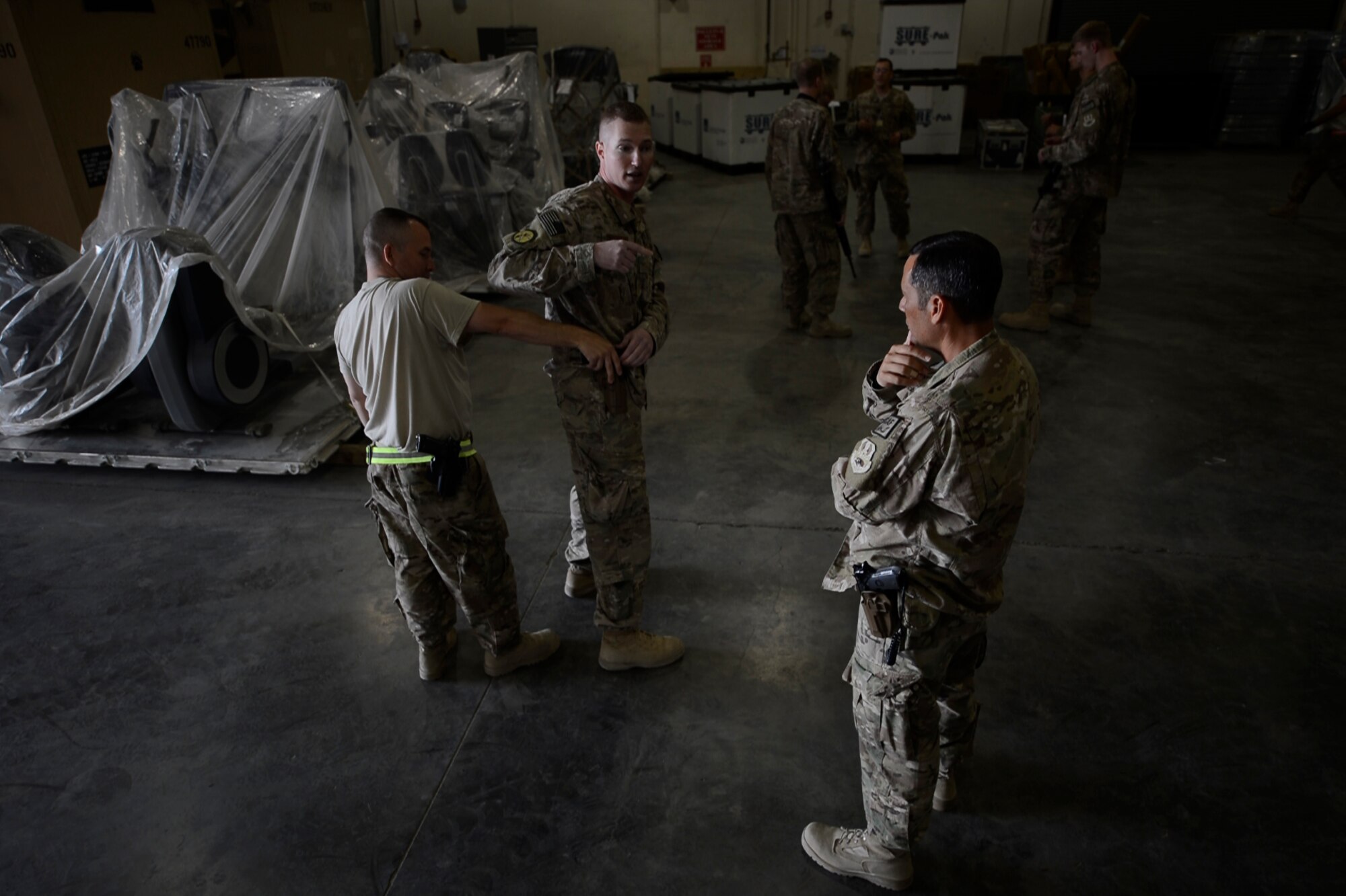 U.S. Air Force Airmen with the 455th Expeditionary Aerial Port Squadron listen to Check Six program training instructions at Bagram Airfield, Afghanistan Oct. 21, 2014. Airmen recently participated in the training, which is intended to help increase Airmen’s awareness and vigilance in case of an active shooter event. (U.S. Air Force photo by Staff Sgt. Evelyn Chavez/Released)