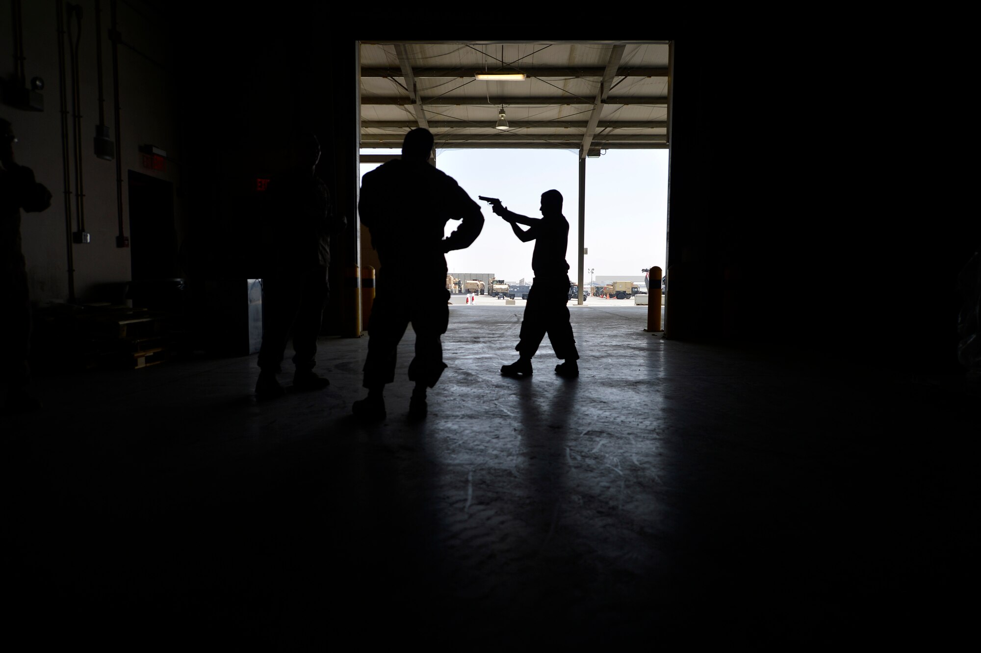 U.S. Air Force Airmen with the 455th Expeditionary Aerial Port Squadron participate in Check Six program training at Bagram Airfield, Afghanistan Oct. 21, 2014. The program is designed to increase military members’ awareness and practice muscle memory that will become critical in the event of an attack or violent occurrence.   (U.S. Air Force photo by Staff Sgt. Evelyn Chavez/Released)