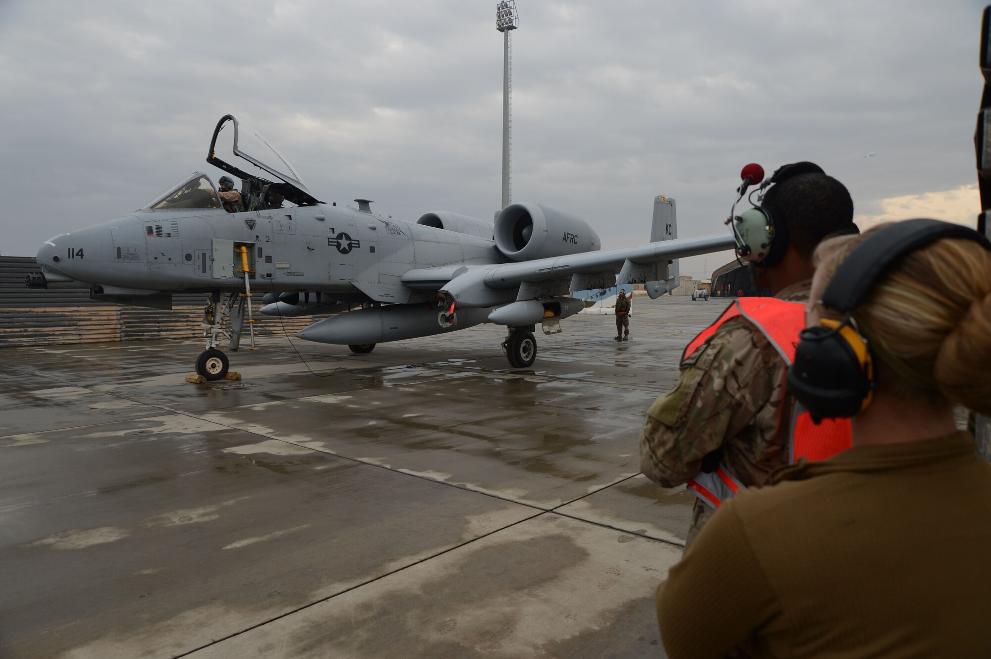 BAGRAM AIRFIELD, Afghanistan -  U.S. Air Force crew chiefs assigned to the 455th Expeditionary Maintenance Squadron watch as Lt. Col Bryan Stone, 303rd Expeditionary Fighter Squadron commander, performs operation checks prior to takeoff Oct. 19, 2014 at Bagram Airfield, Afghanistan. The 303 EFS was responsible for close air support operations throughout Afghanistan and is succeeded by the 163rd Expeditionary Fighter Squadron. The 303 EFS will return to the 442nd Fighter Wing at Whiteman Air Force Base, Mo. (U.S. Air Force photo by Master Sgt. Cohen A. Young/Released)