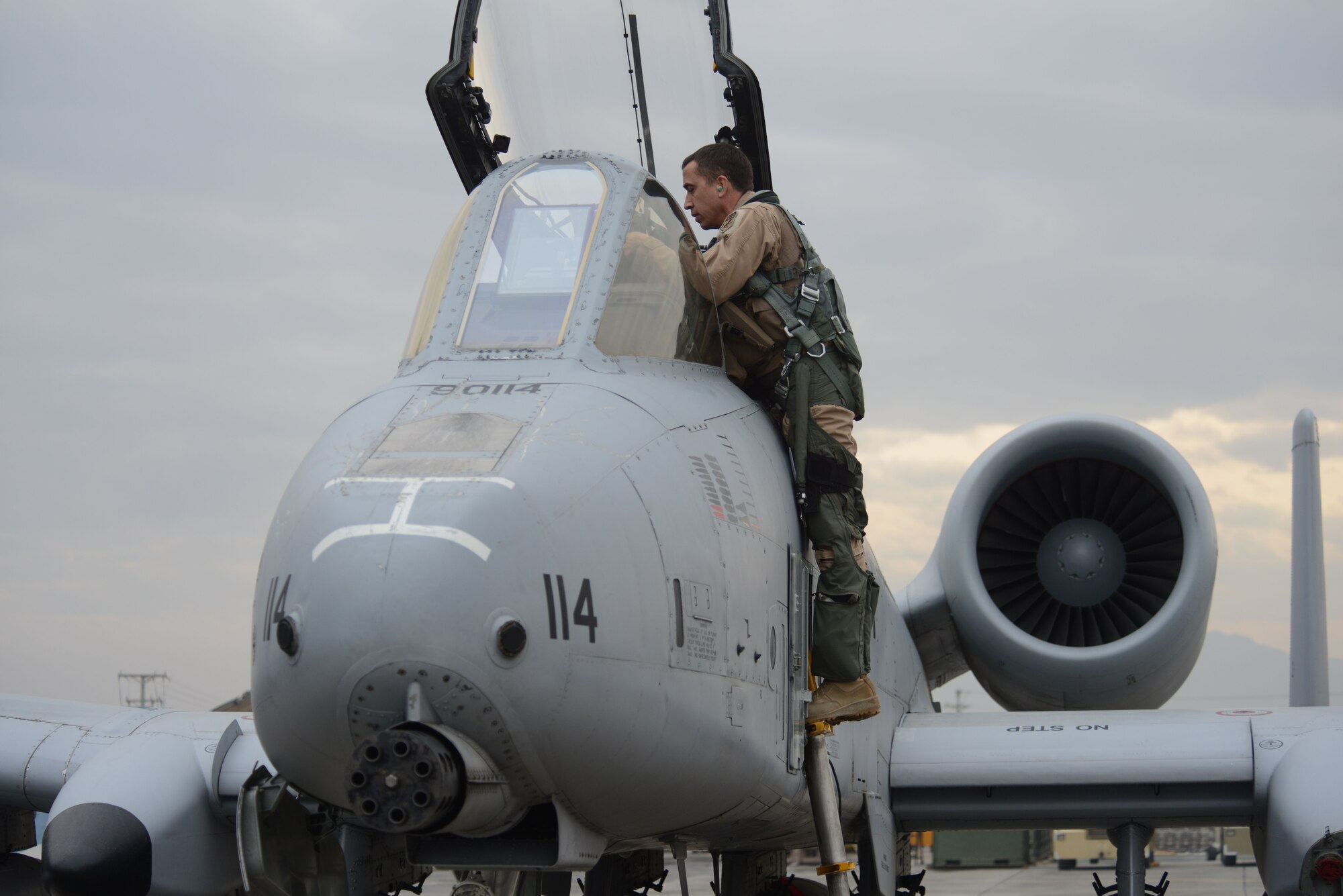 BAGRAM AIRFIELD, Afghanistan -  U.S. Air Force Lt. Col Bryan Stone, 303rd Expeditionary Fighter Squadron commander, checks out the cockpit of an A-10 Thunderbolt II prior to takeoff Oct. 19, 2014 at Bagram Airfield, Afghanistan. The 303 EFS was responsible for close air support operations throughout Afghanistan and is succeeded by the 163rd Expeditionary Fighter Squadron. The 303 EFS will return to the 442nd Fighter Wing at Whiteman Air Force Base, Mo. (U.S. Air Force photo by Master Sgt. Cohen A. Young/Released)