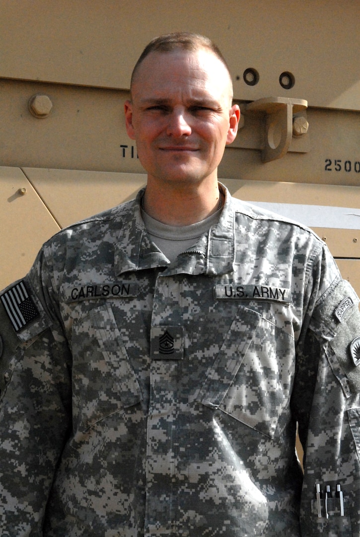 Sgt. Maj. Ted Carlson, the brigade operations sergeant major for the Oregon National Guard's 41st Infantry Brigade Combat Team, was recently asked to use his civilian skills as a long-haul driver for Federal Express to improve convoy routes in Iraq.