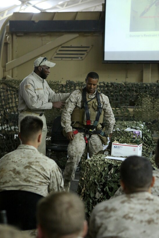 A Marine with Combat Logistics Battalion 11, 11th Marine Expeditionary Unit (MEU), receive a brief during Mine Resistant Ambush Protected (MRAP) vehicle egress training, Oct. 17. The 11th MEU is deployed with the Makin Island Amphibious Ready Group as a theater reserve and crisis response force throughout U.S. Central Command and the U.S. 5th Fleet area of responsibility. (U.S. Marine Corps photo by Sgt. Melissa Wenger/ Released)
