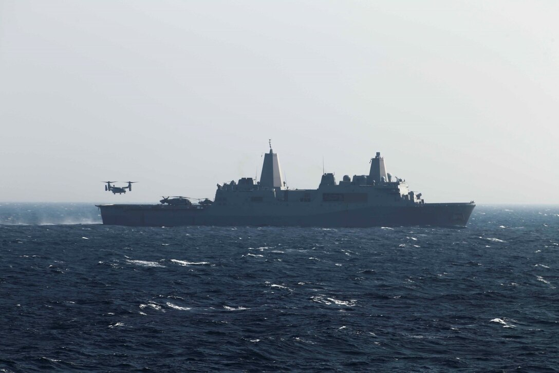 An MV-22B Osprey with Marine Medium Tiltrotor Squadron 163 (Reinforced), 11th Marine Expeditionary Unit (MEU), lands on the flight deck of the amphibious transport dock USS San Diego (LPD 22), Oct. 22.  The Makin Island Amphibious Ready Group (ARG), and the embarked 11th MEU are deployed in support of maritime security operations and theater security cooperation efforts in the U.S. 5th Fleet area of responsibility. (U.S. Marine Corps photo by Cpl. Laura Y. Raga/Released)