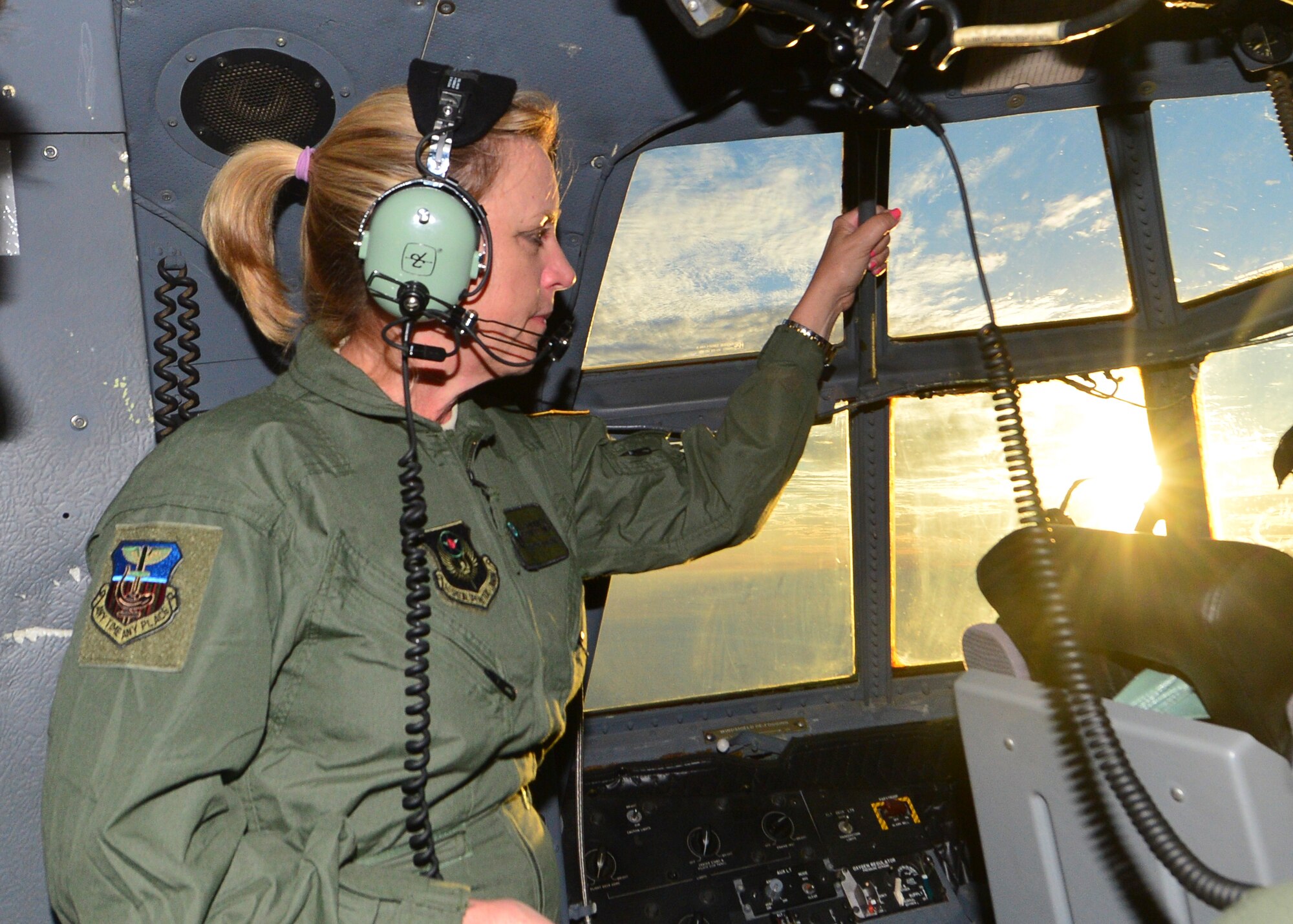 Secretary of the Air Force Deborah Lee James looks out a window on board an AC-130U Spooky Gunship, Oct. 20, 2014. During her two-day visit to Hurlburt Field, Fla., James met with Airmen and got a first-hand look at Air Commando operations. (U.S. Air Force photo/Senior Airman Christopher Callaway)