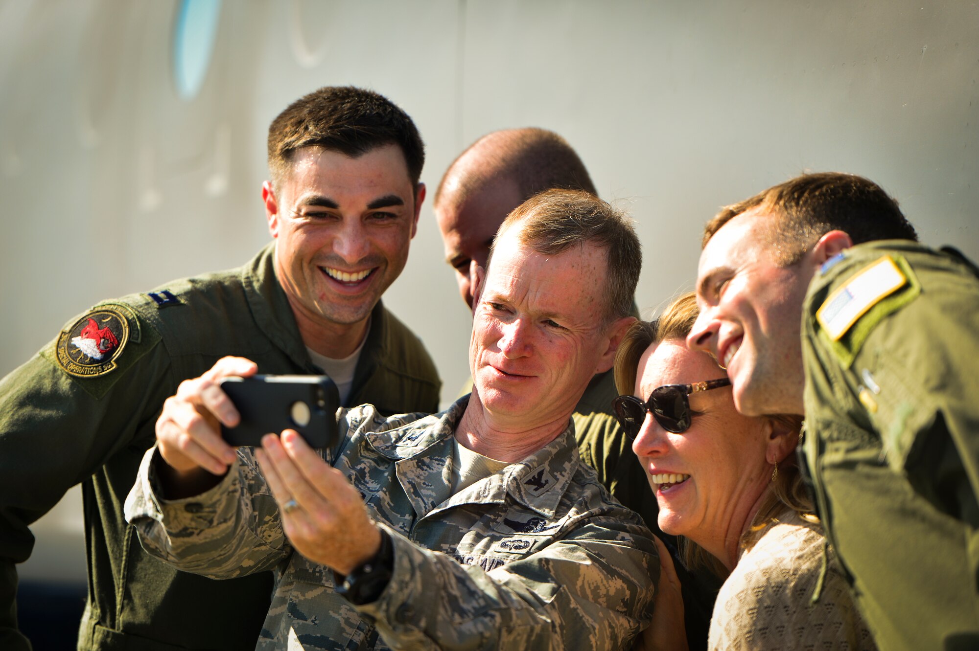 Secretary of the Air Force Deborah Lee James takes a selfie with Col. Bill West, 1st Special Operations Wing commander, and other 1st SOW personnel at Hurlburt Field, Fla., Oct. 20, 2014. Secretary James met with Airmen and toured various facilities here to familiarize herself with Air Commando operations. (U.S. Air Force photo/Senior Airman Christopher Callaway)