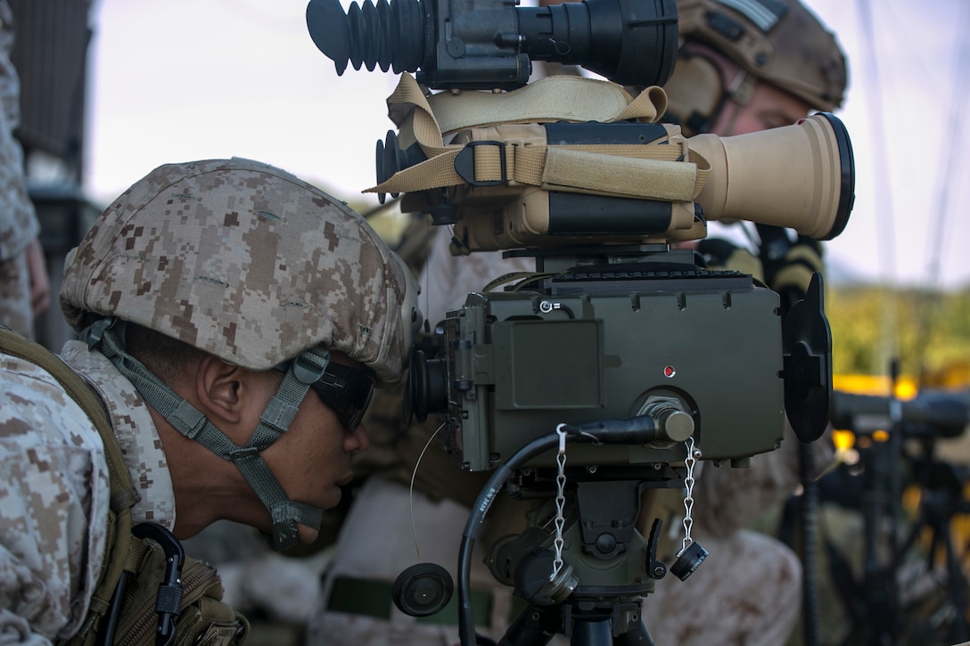 Cpl. Viktor Cadiente prepares to mark a target Oct. 8 at Rodriguez Live Fire Complex during Korean Marine Exchange Program 14-13. KMEP familiarizes U.S. Marines with the Korean Peninsula and builds upon an existing strong relationship between Republic of Korea and U.S. Marines. Cadiente is from Honolulu, Hawaii, and is a joint fires observer with 5th Air Naval Gunfire Liaison Company, III Marine Expeditionary Force Headquarters Group, III MEF.