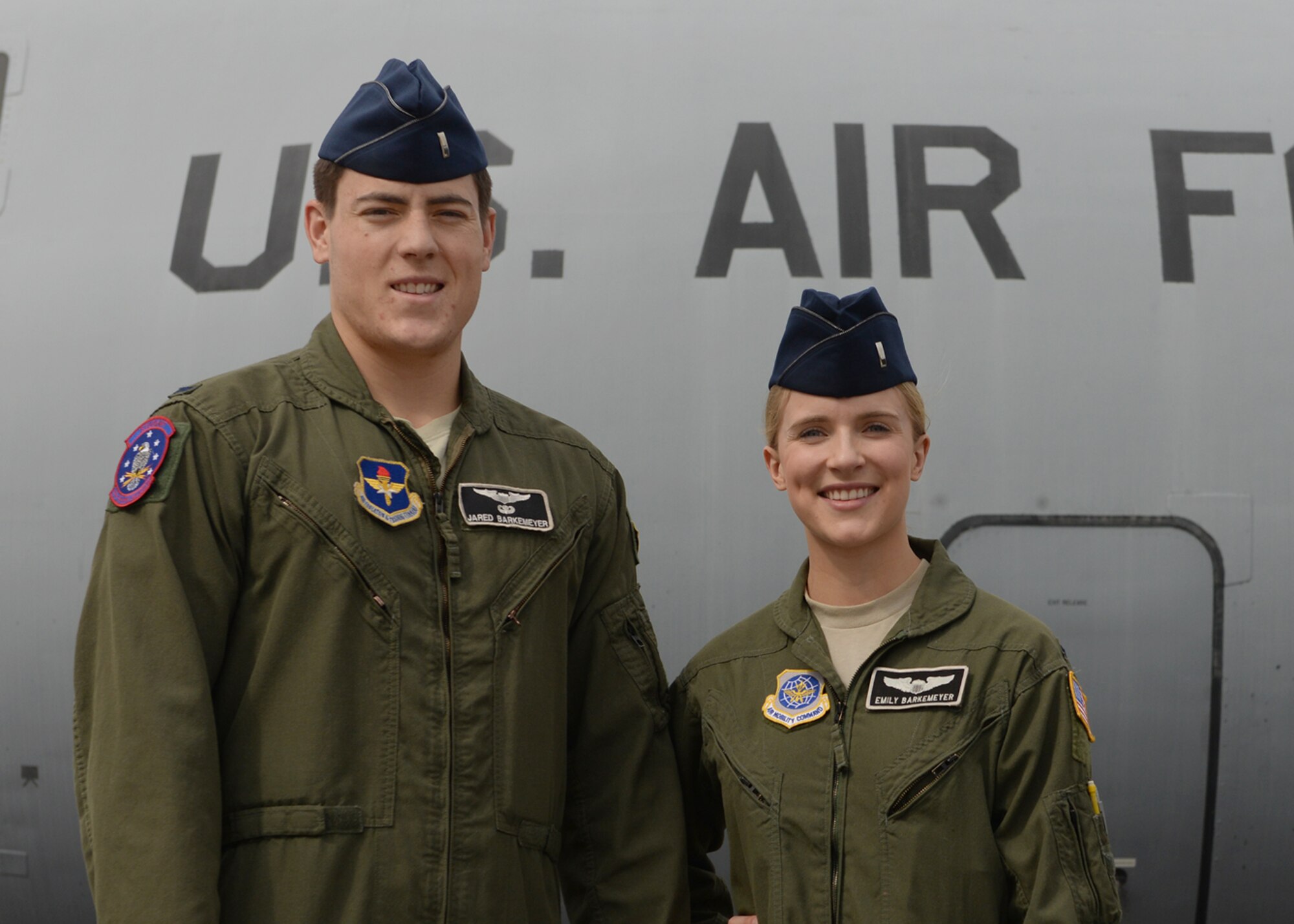 ALTUS AIR FORCE BASE, Okla. – U.S. Air Force 1st Lts. Jared and Emily Barkemeyer, C-17 Globemaster III cargo aircraft student pilots, pose together at Wings of Freedom Park, Oct. 22, 2014. The newly wed Barkemeyers have been training as pilots together since August 2014, and will soon be stationed at McCord AFB, WA. (U.S. Air Force photo by Airman 1st Class Nathan Clark/Released)