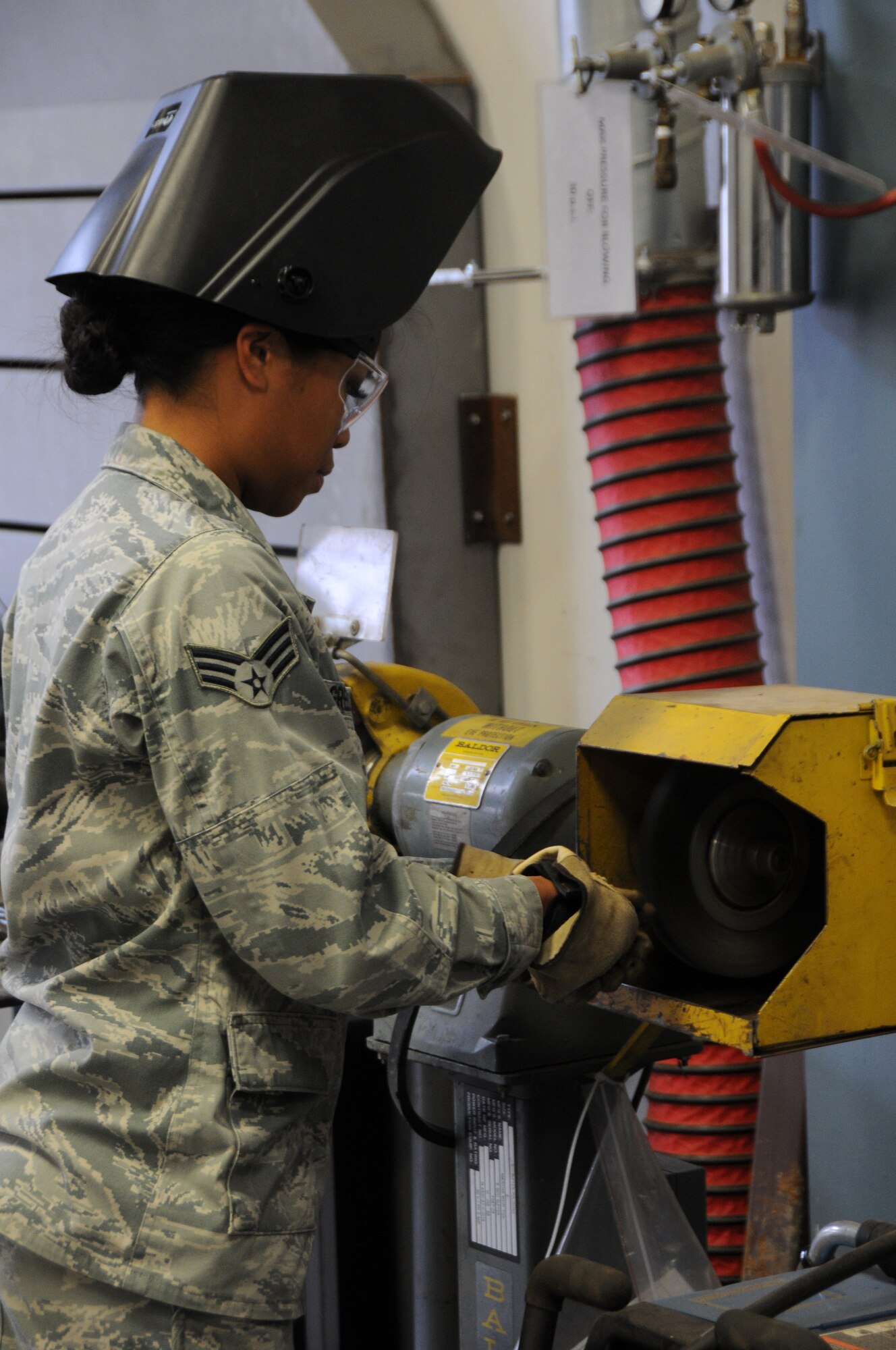 Senior Airman Sarah Greer of the 210th Rapid Engineer Deployable Heavy Operational Repair Squadron Engineer (REDHORSE) Squadron, New Mexico Air National Guard, participates in a welding class held at Ebbing Air National Guard Base, Fort Smith, Ark., Sept. 17, 2014. Six Airmen from the 210th were trained by the 188th Civil Engineering Squadron REDHORSE members led by Tech. Sgt. Bryan Sutton, 188th CES welding instructor. (U.S. Air National Guard photo by Airman 1st Class Cody Martin/Released)