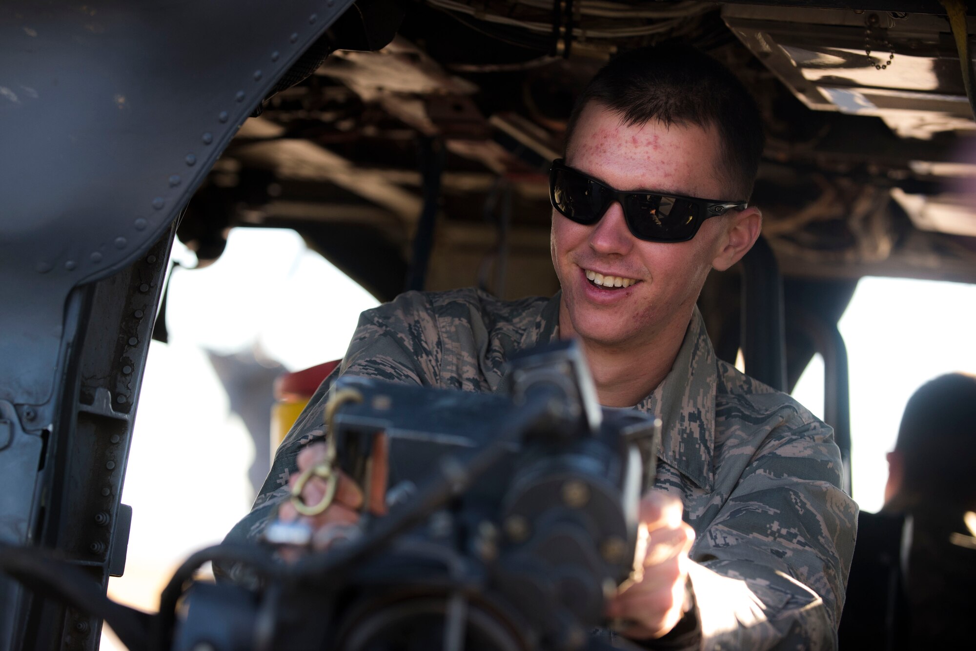 U.S. Air Force Cadet 4th Class Collin Parsons, Cadet Squadron 9 (CS-09), sits in an HH-60G Pave Hawk static display at the U.S. Air Force Academy, Colo., Oct. 16, 2014. During a visit to the Academy, Moody Airmen had the opportunity to educate and mentor cadets on the rescue mission and the operational Air Force.
(U.S. Air Force photo by Airman 1st Class Dillian Bamman/Released)
