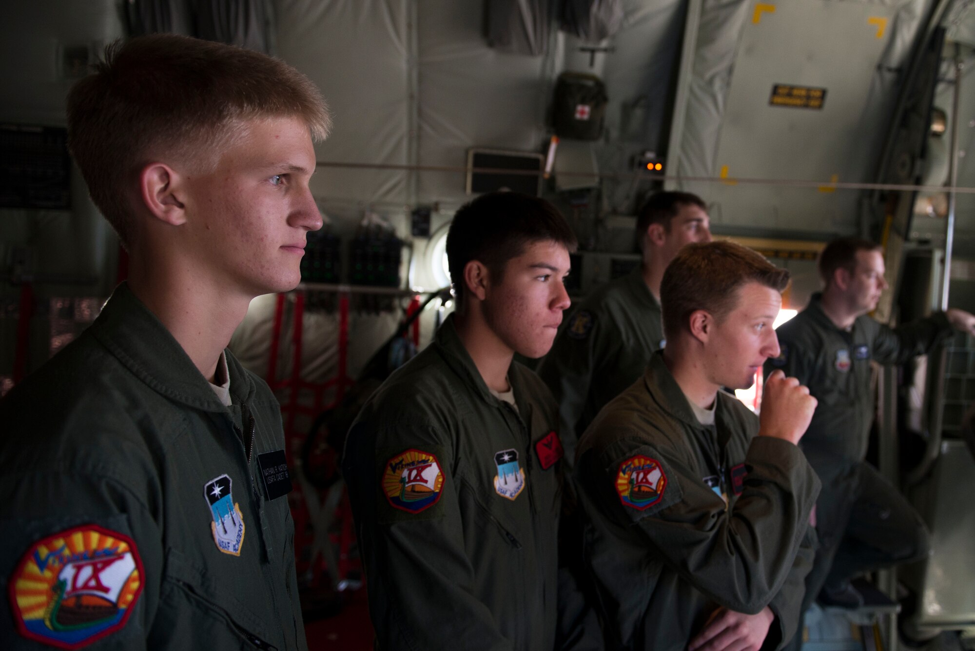 Cadets from Cadet Squadron 9 listen during an HC-130J Combat King II static display presentation Oct. 16, 2014, at the U.S. Air Force Academy, Colo. In addition to the HC-130, the 23d Wing showcased two HH-60G Pave Hawks from Nellis Air Force Base, Nev., and two A-10C Thunderbolt II’s from Moody AFB, Ga. (U.S. Air Force photo by Airman 1st Class Dillian Bamman/Released)