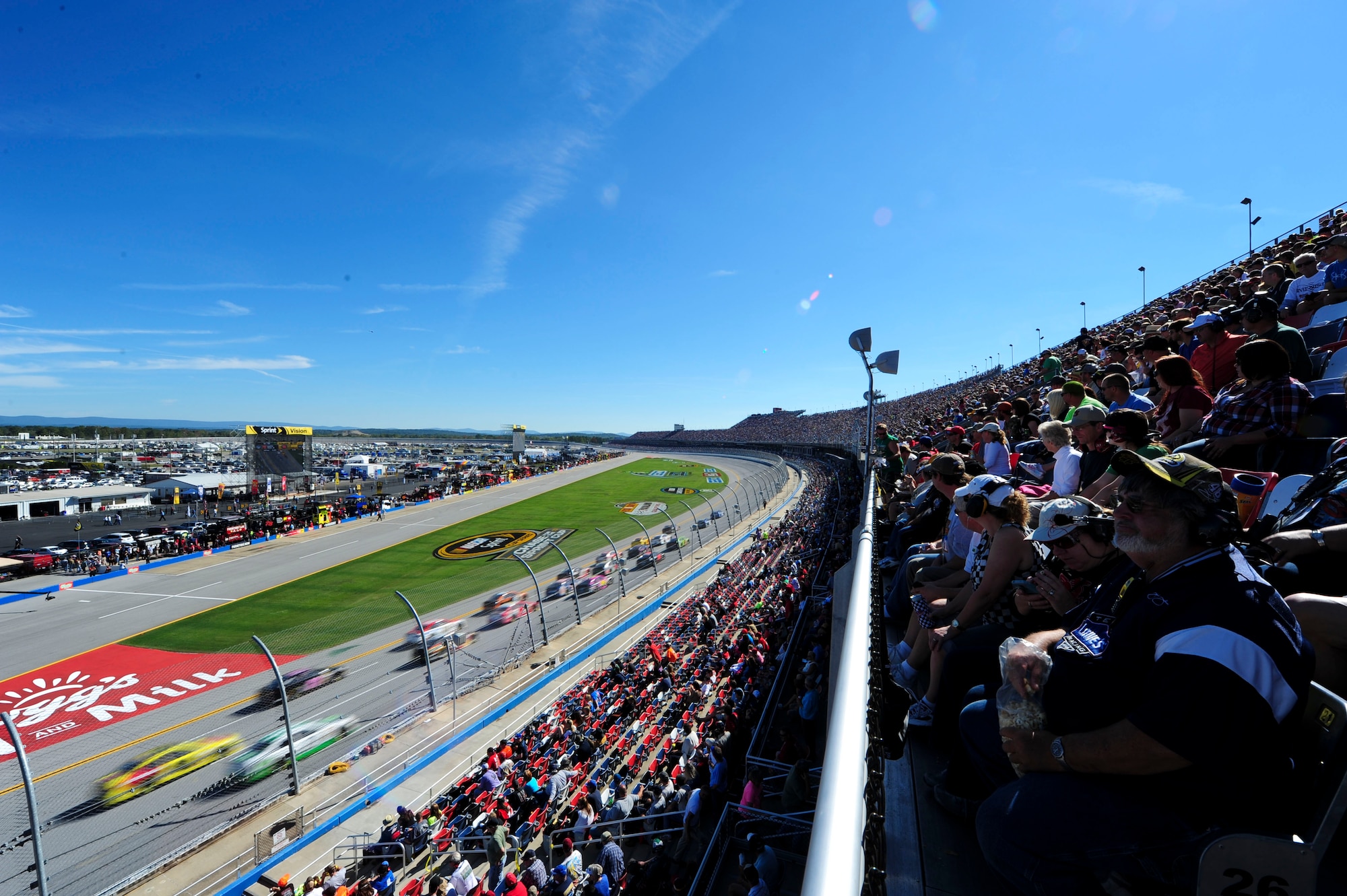 The crowd watches as the cars speed by during the Geico 500 race at the Talladega Superspeedway in Talladega, Ala., Oct. 10, 2014. The Talladega Superspeedway is arguably NASCAR’s most competitive race. (U.S. Air Force photo by Airman 1st Class Alexa Culbert)