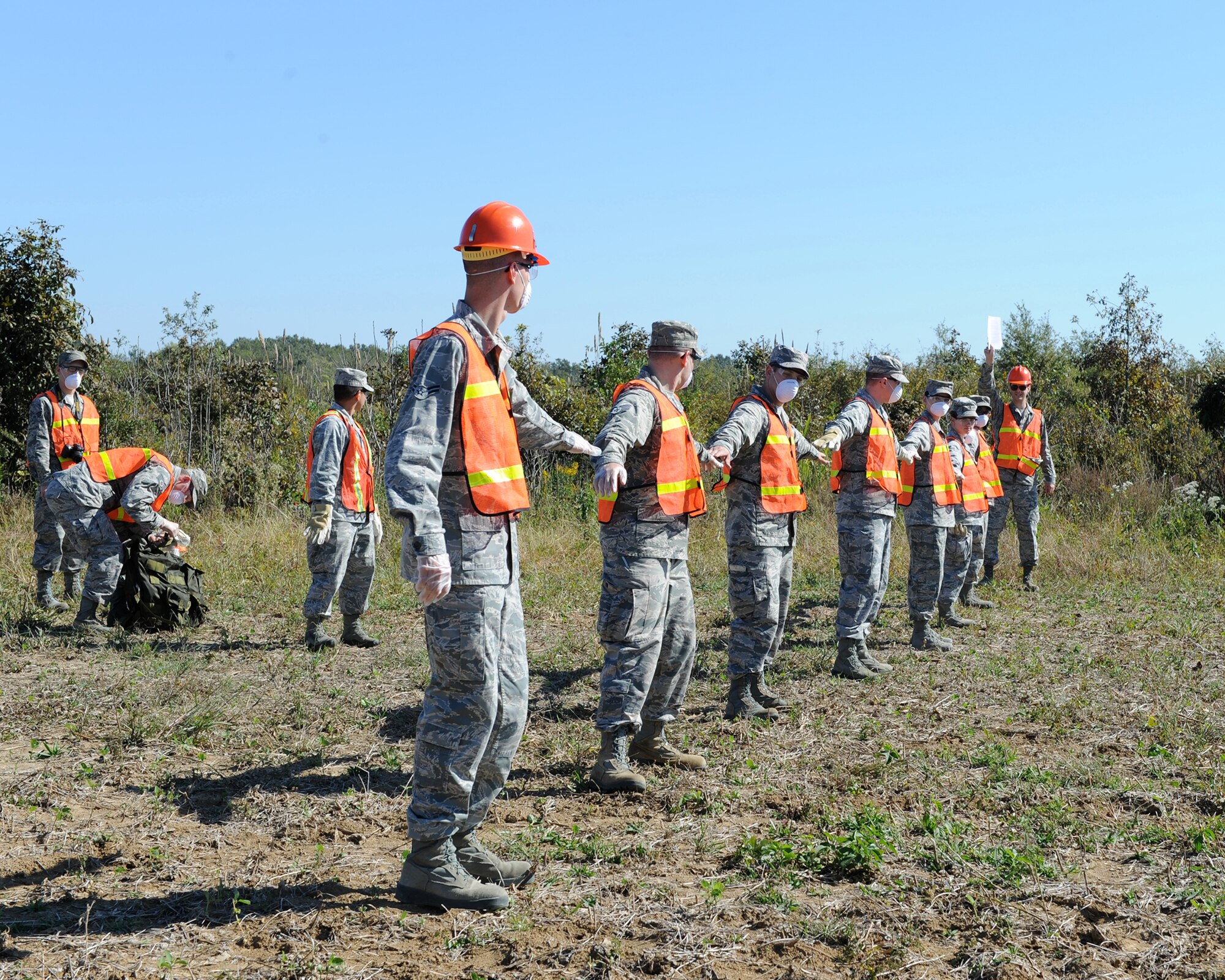 Columbus Air Force Base Search and Recovery team members prepare for a grid search of a simulated T-6A Texan II crash site during a Golden Triangle Regional Airport disaster preparedness exercise Oct. 21 at the airport. In addition to the GTR exercise, Columbus AFB also exercised security forces response, search and recovery operations, casualty affairs and next-of-kin notification. (U.S. Air Force photo/Elizabeth Owens)