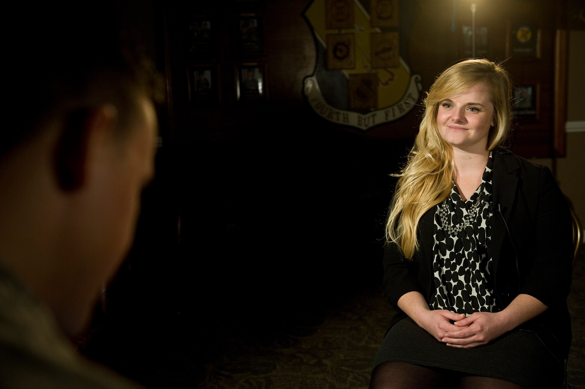 Jaime Thompson, U.S. Navy Lt. Seymour Johnson’s great-granddaughter, sits down for an interview with Airman 1st Class Nathan Stout, 4th Fighter Wing Public Affairs broadcast journalist, after a tour of Seymour Johnson Air Force Base, North Carolina, Oct. 17, 2014. During her visit, Thompson familiarized herself with Seymour Johnson’s history; both the man and the base. For the first time in her life she was able to discover the full legacy left behind by her great-grandfather. (U.S. Air Force photo/Airman 1st Class Aaron Jenne) 