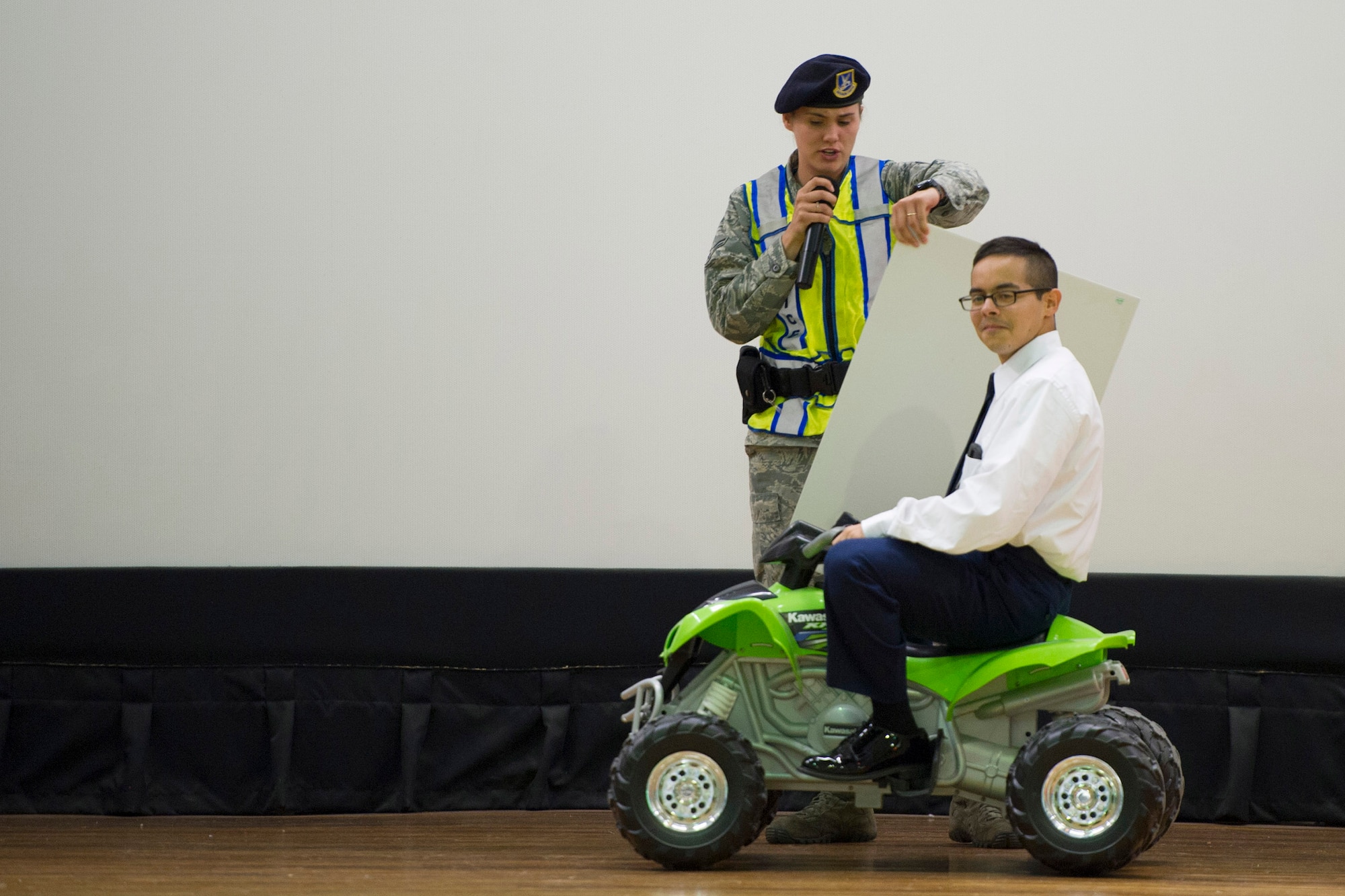 Airmen of the 45th Space Wing Mission Support Group perform a skit for an audience during Wingman Day All Call, Oct. 17, 2014, at Patrick Air Force Base, Fla. More than 1,300 Team Patrick-Cape members attended Wingman Day and took part in a run and classes designed to engage members in unit conversations on core values and respect. (U.S. Air Force photo/Matthew Jurgens) (Released) 