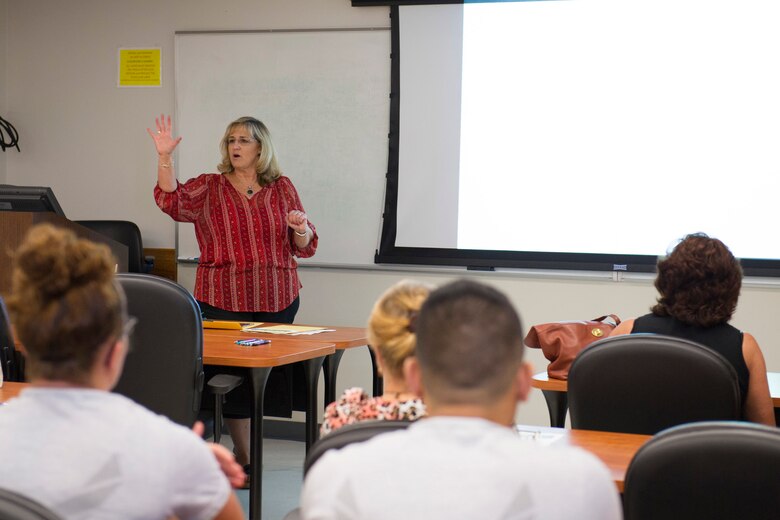 Patricia Gragg, 45th Space Wing Sexual Assault Response Coordinator, teaches a class during Wingman University as part of Wingman Day at Patrick Air Force Base, Fla, Oct. 17, 2014. Participants selected theme-based, university campus-style classes designed to encourage and encompass the Comprehensive Airmen Fitness resilience domains; which are physical, social, mental and spiritual. (U.S. Air Force photo/Matthew Jurgens) (Released) 