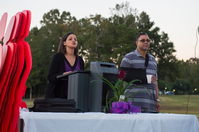 Brenda Edmond, 628th Medical Group Family Advocacy outreach program manager, speaks at the Domestic Violence Candlelight Vigil at the Municipal Building in Goose Creek, S.C., Oct. 21, 2014. The Candlelight Vigil was held in remembrance of the victims of domestic violence in South Carolina. The event was the second year that JB Charleston was an equal participant in the planning and coordination with the city of Goose Creek. (U.S. Air Force photo/Senior Airman George Goslin)