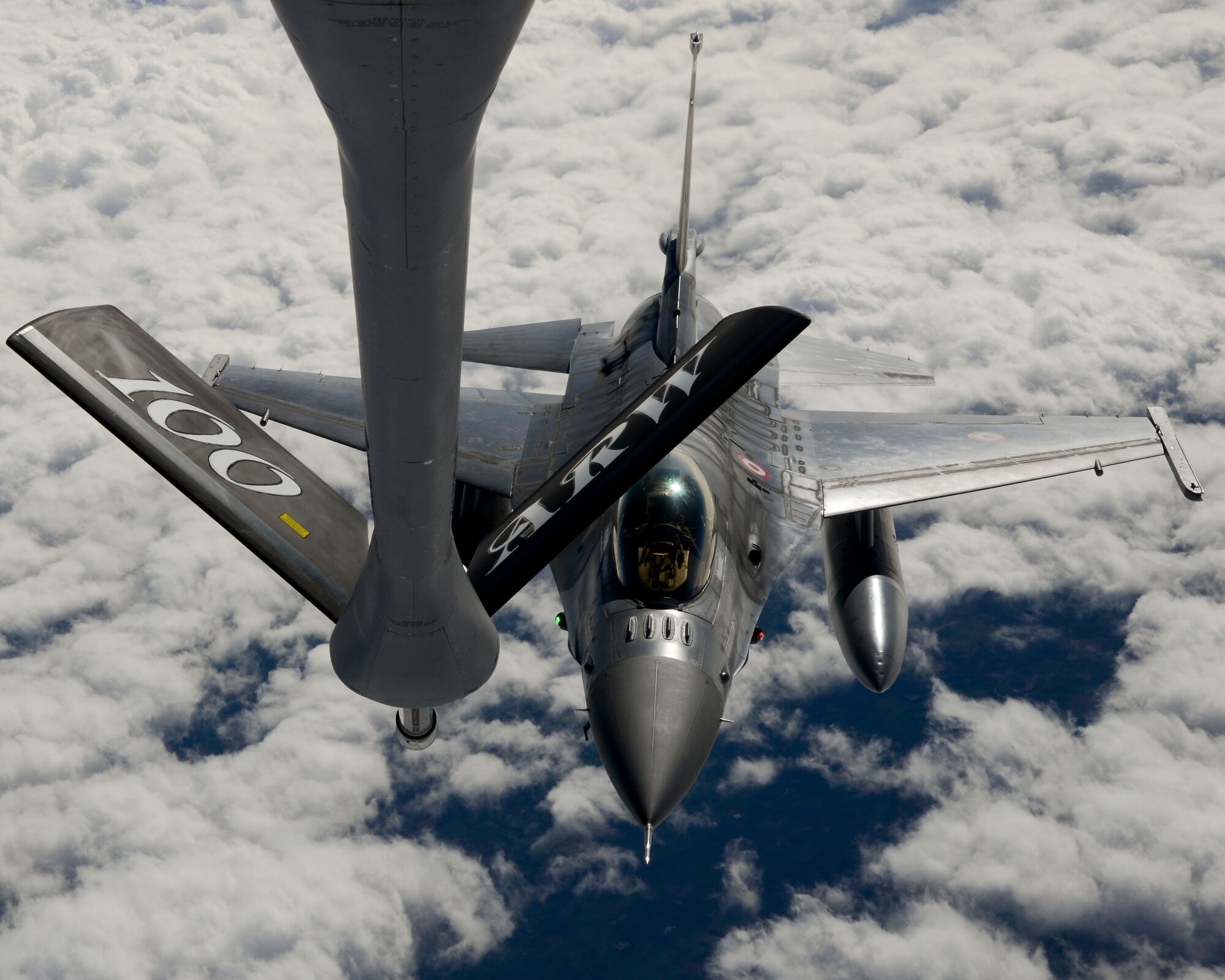 A Turkish air force F-16 Fighting Falcon prepares to take fuel from a KC-135 Stratotanker assigned to RAF Mildenhall, England, during the NATO-led exercise Noble Justification Oct. 21, 2014, hosted by Istres Air Base, France. The exercise involves more than 13,000 service members and takes place across Europe and the Mediterranean. (U.S. Air Force photo/Senior Airman Victoria H. Taylor/Released)