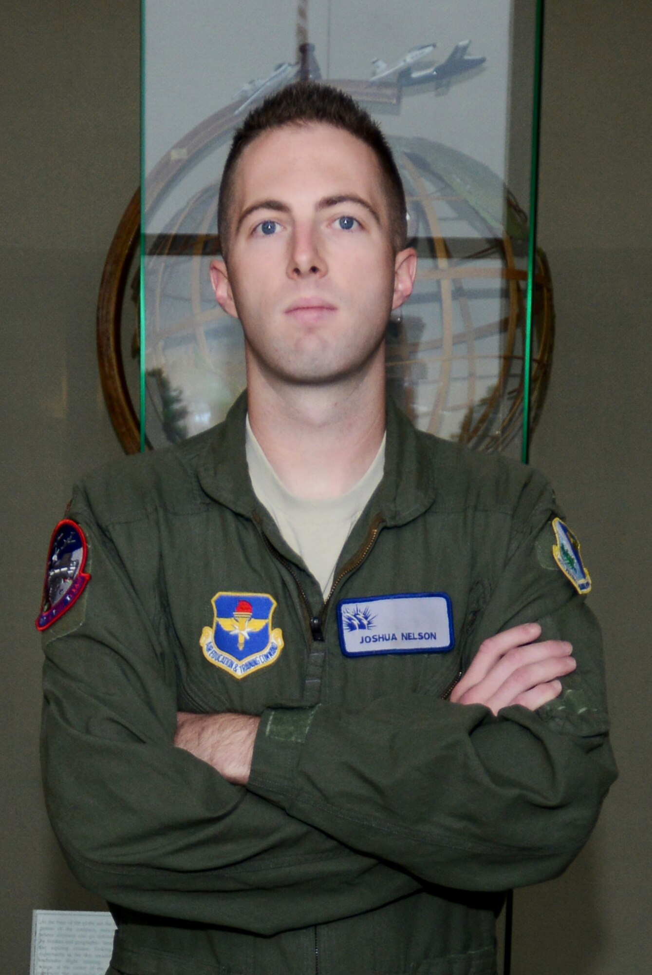 2nd Lt. Joshua Nelson poses for a portrait at the 47th Flying Training Wing headquarters on Oct. 23, 2014. Nelson was credited for stopping a potential murder, then stopping a potential suicide, during a trip to Walmart.(U.S. Air Force photo by Staff Sgt. Steven R. Doty)