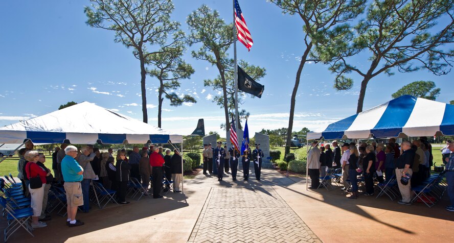 Hurlburt Field Honor Guard members present the colors during a memorial ceremony at the Airpark on Hurlburt Field, Fla., Oct. 19, 2014. During the memorial, guest speakers talked about the accomplishments of past and present Air Commandos. (U.S. Air Force photo/Senior Airman Krystal M. Garrett)