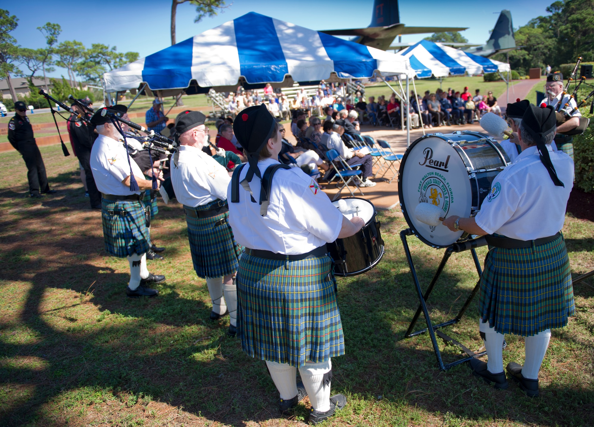 The Emerald Coast Pipes and Drums Band plays ”Amazing Grace” during a memorial ceremony at the Airpark on Hurlburt Field, Fla., Oct. 19, 2014. During the memorial, speakers talked about the accomplishments of past and present Air Commandos. (U.S. Air Force photo/Senior Airman Krystal M. Garrett)