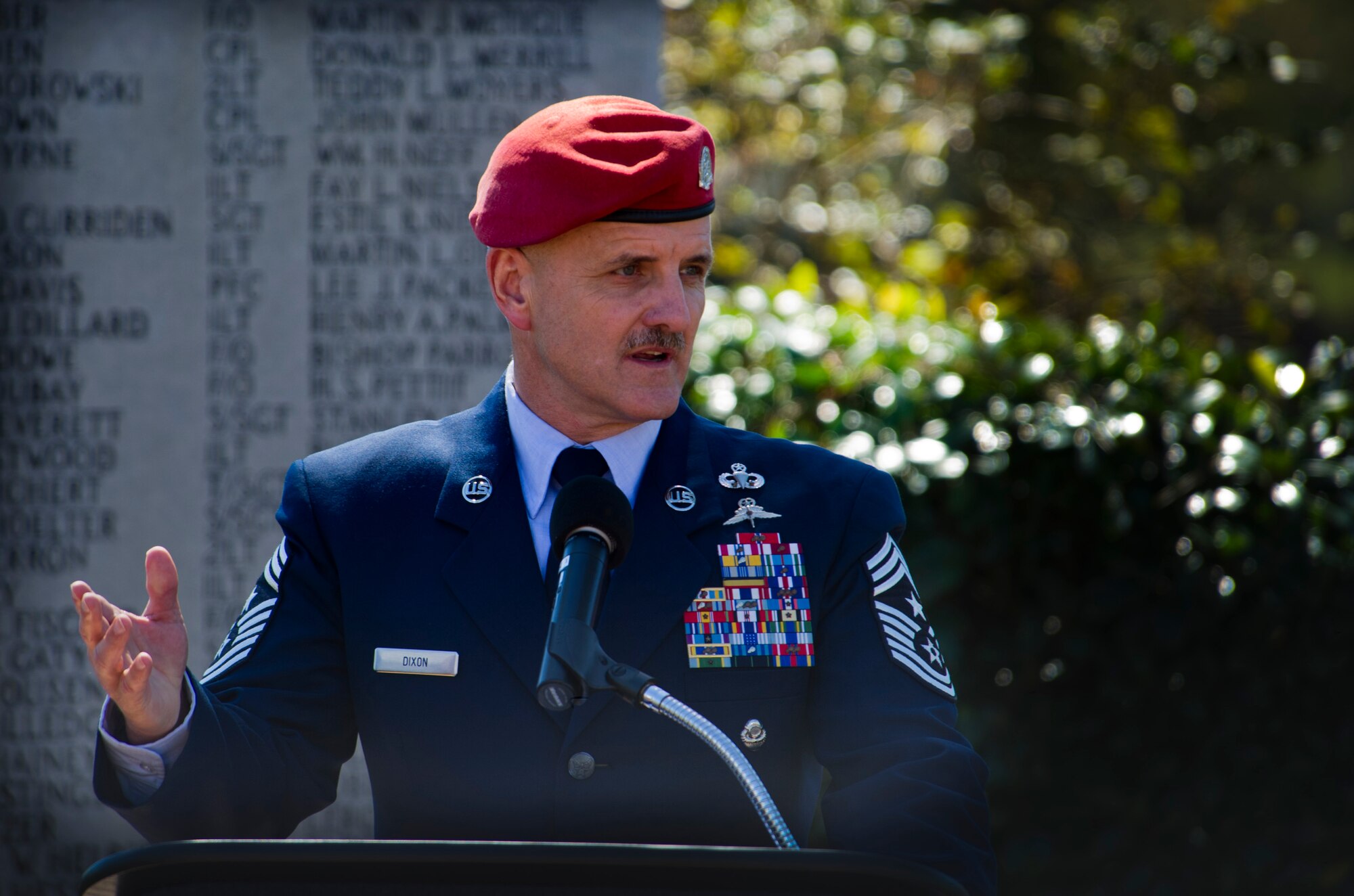 Chief Master Sgt. Bruce Dixon, 24th Special Operations Wing command chief, speaks about the accomplishments of past and present Air Commandos during a memorial ceremony at the Airpark on Hurlburt Field, Fla., Oct. 19, 2014. The memorial ceremony was part of a reunion of past and present Air Commandos from all over the country. (U.S. Air Force photo/Senior Airman Krystal M. Garrett)