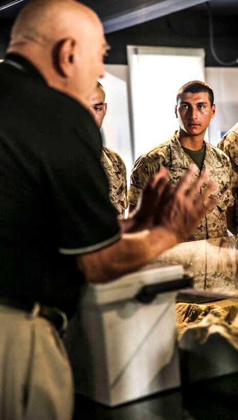 Private Axel L. Franco, Platoon 1034, Bravo Company, 1st Recruit Training Battalion, learns the roots of Marine Corps history during his visit to the Marine Corps Command Museum at Marine Corps Recruit Depot San Diego, Oct. 8. Franco moved from Guatemala to California with his mother at the age of one after the death of his father.