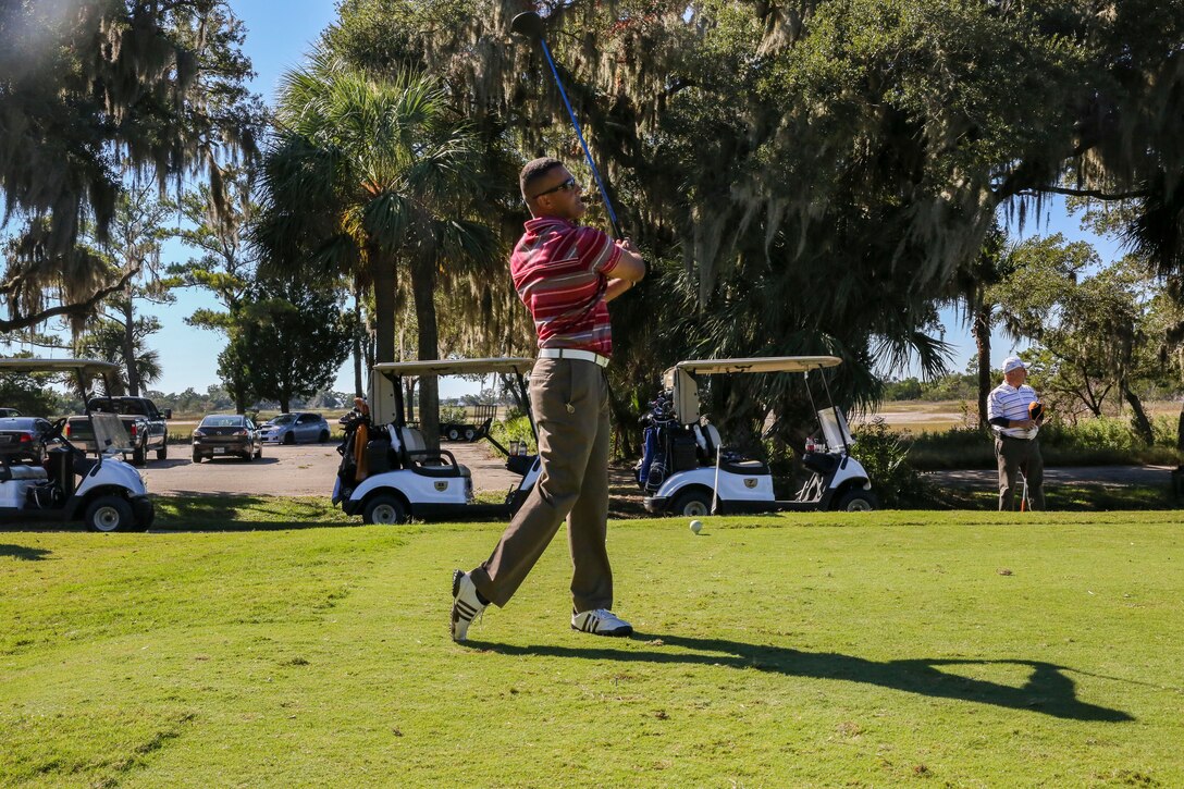 Gunnery Sgt. Michael Montanez competes in the Red Ribbon golf tournament at The Legends, Oct. 17. The free tournament  promoted awareness of the negative effects drugs can have on individuals and communities for Red Ribbon Week. Red Ribbon Week is held each year in honor of Enrique Camarena, a Marine and drug enforcement agent who was killed in 1985 while reducing the amount of drugs trafficked into the United States. The theme this year is “Love yourself, be drug free,” and encourages community unity against drug abuse.
