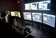 Second Lt. Michael Emard creates slides from video snapshots Oct. 15, 2014, during a demonstration of the new Enhanced Reporting, Narrative Event Streaming Tool developed by the Air Force Research Lab, at Wright-Patterson Air Force Base, Ohio. The program streamlines some routine tasks performed by intelligence analysts in an effort to increase their overall effectiveness and allow for faster distribution of intellgence to those that need it. Emard is a 711th Human Performance Wing behavioral scientist. (U.S. Air Force photo/Wesley Farnsworth)