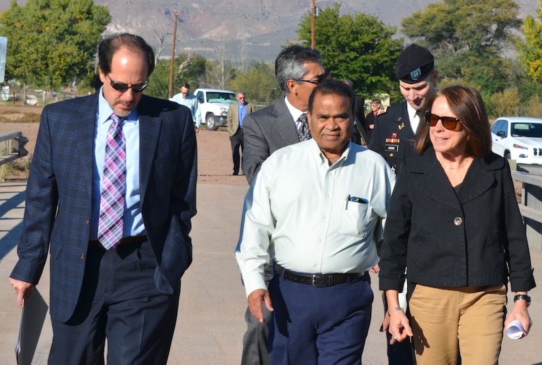 SOCORRO, N.M., -- (r-l), Assistant Secretary of the Army (Civil Works) Jo-Ellen Darcy joins Chief Engineer and CEO of the Middle Rio Grande Conservancy District Subhas Shah, and Deputy Engineer John D'Antonio at the groundbreaking ceremony for the first two phases of the San Acacia Levee project, Oct. 22, 2014.