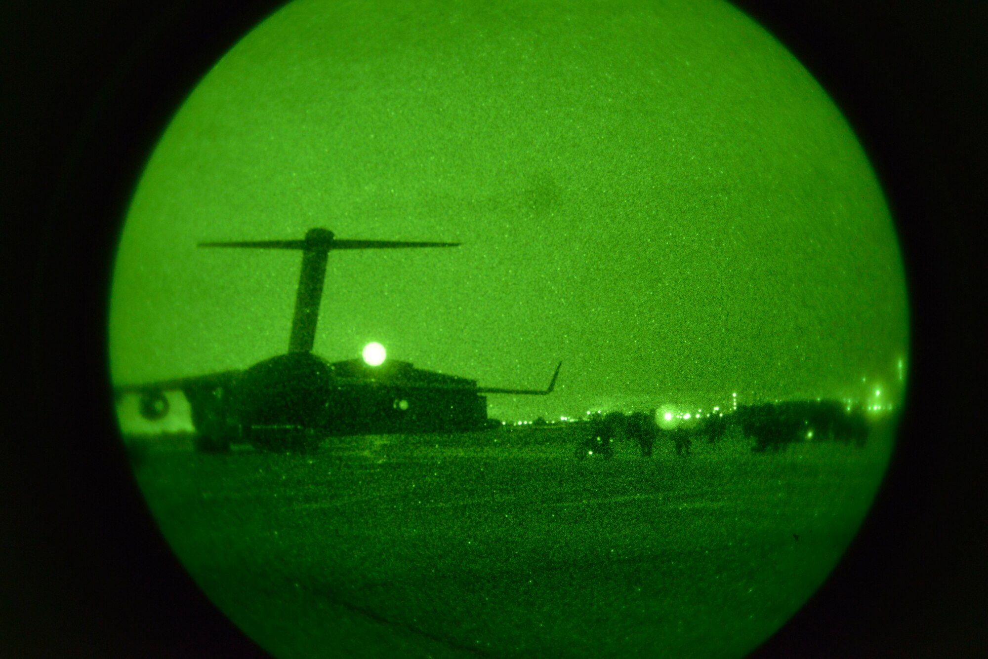 Army Rangers from the 2nd Battalion, 75th Ranger Regiment stationed at Joint Base Lewis-McChord, Wash., wait to load a C-17 Globemaster during an exercise on the flightline Oct. 15, 2014, at Fairchild Air Force Base, Wash. The 75th Ranger Regiment is a lethal, agile and versatile special operations force that conducts forcible entry operations and special operations raids across the entire spectrum of combat.  (U.S. Air Force photo/Airman 1st Class Janelle Patiño)