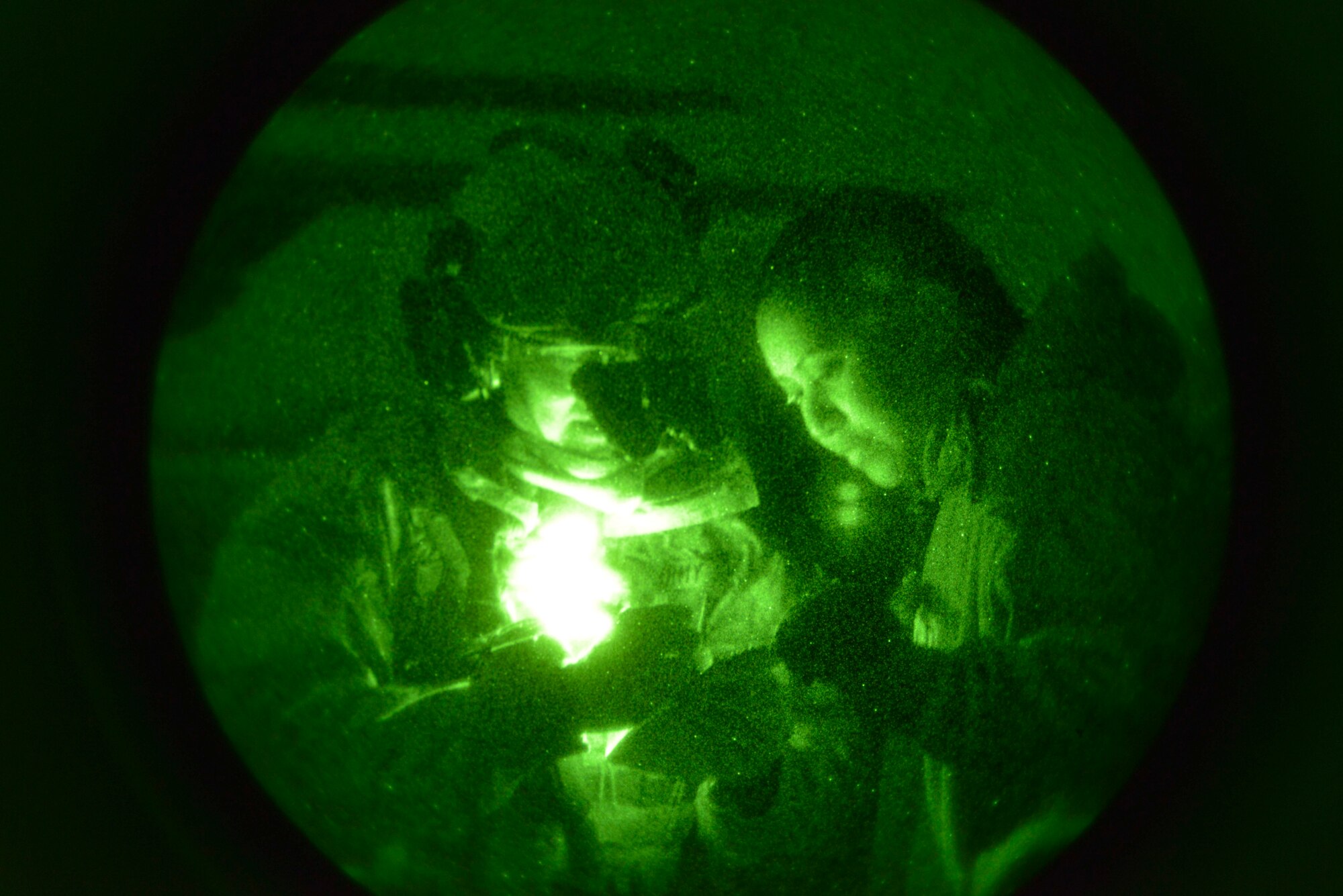 An Army Ranger from the 2nd Battalion, 75th Ranger Regiment stationed at Joint Base Lewis-McChord, Wash., confirms tactical information before loading into a C-130 Hercules during a joint exercise on the flightline Oct. 15, 2014, at Fairchild Air Force Base, Wash. Army Rangers participate in exercises periodically to maintain a high level of combat readiness. (U.S. Air Force photo/Airman 1st Class Janelle Patiño)