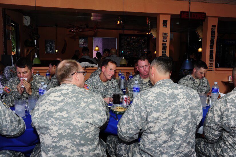 Maj. Gen. Joseph P. DiSalvo, Commanding General, U.S. Army South, ate lunch with Joint Task Force-Bravo leaders, which was then followed by a tour of the new construction areas on Soto Cano Air Base, Honduras, Oct. 21, 2014.  Newly constructed areas included the new Finance and Post Offices, as well as the building that will house the 228th Squadron.. (Photo by Martin Chahin)  