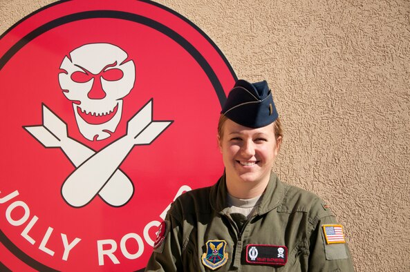 Second Lt. Holley Macpherson, 320th Missile Squadron deputy missile combat crew commander, poses outside the 90th Operations Group Oct. 20, 2014. Recently, Macpherson pulled her first alert in a launch control center in the F.E. Warren Air Force Base, Wyo., Missile Complex , where she and a crew commander monitored the ICBM mission in their flight area. (U.S. Air Force photo by Senior Airman Jason Wiese)
